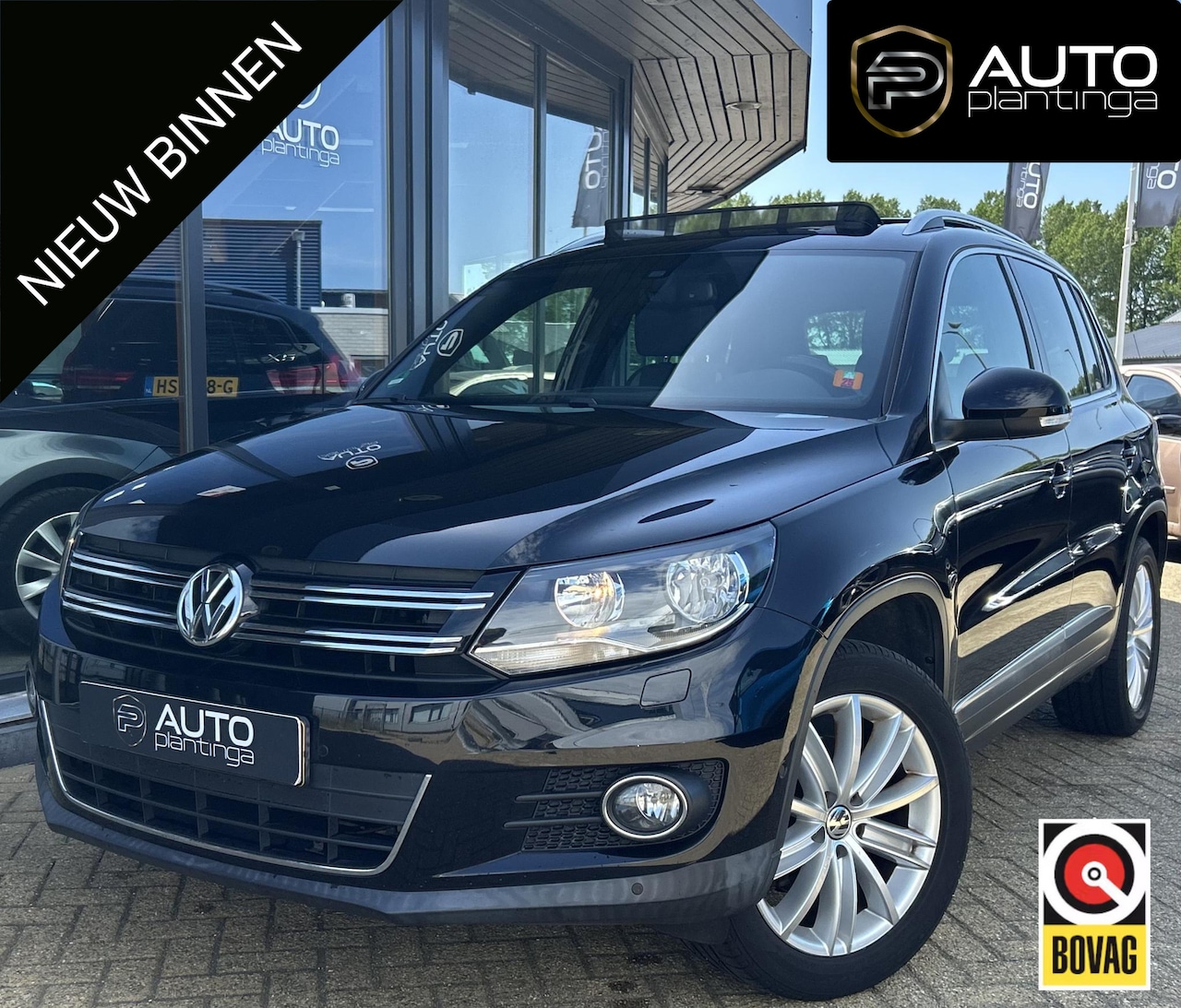 Volkswagen Tiguan - 1.4 TSI Comfort&Design 160PK | PANO | Trekhaak | Stoelverwarming | Parkeersensoren Voor en - AutoWereld.nl