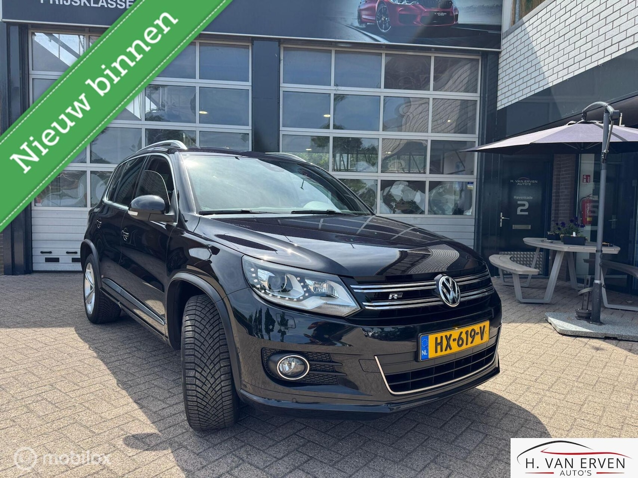 Volkswagen Tiguan - 1.4 TSI R-Line SCHUIFKANTELDAK NAVI PDC - AutoWereld.nl