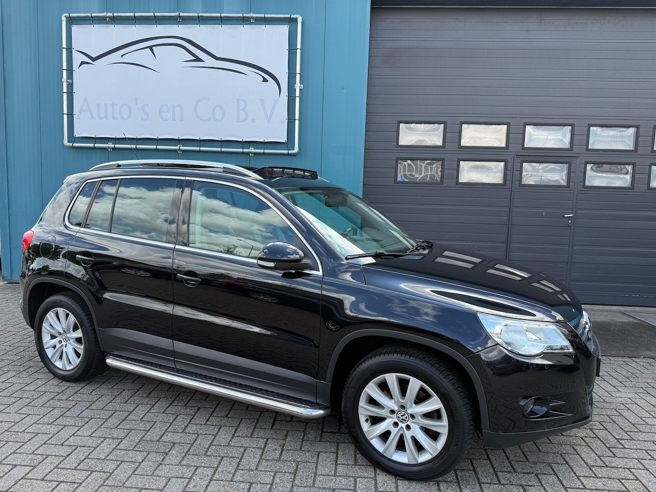 Volkswagen Tiguan - 2.0 TSI Comfort&Design 4Motion Automaat Panoramadak Clima Cruise 17" Pdc Onderh boekjes NA - AutoWereld.nl