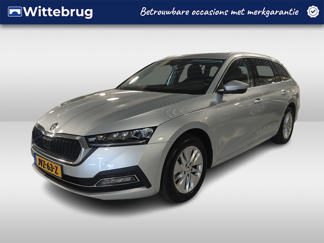 Skoda Octavia Combi - 1.0 e-TSI Business Edition / Parkeersensoren v&a / Navi / Verwarmbare stoelen voor / Elekt - AutoWereld.nl