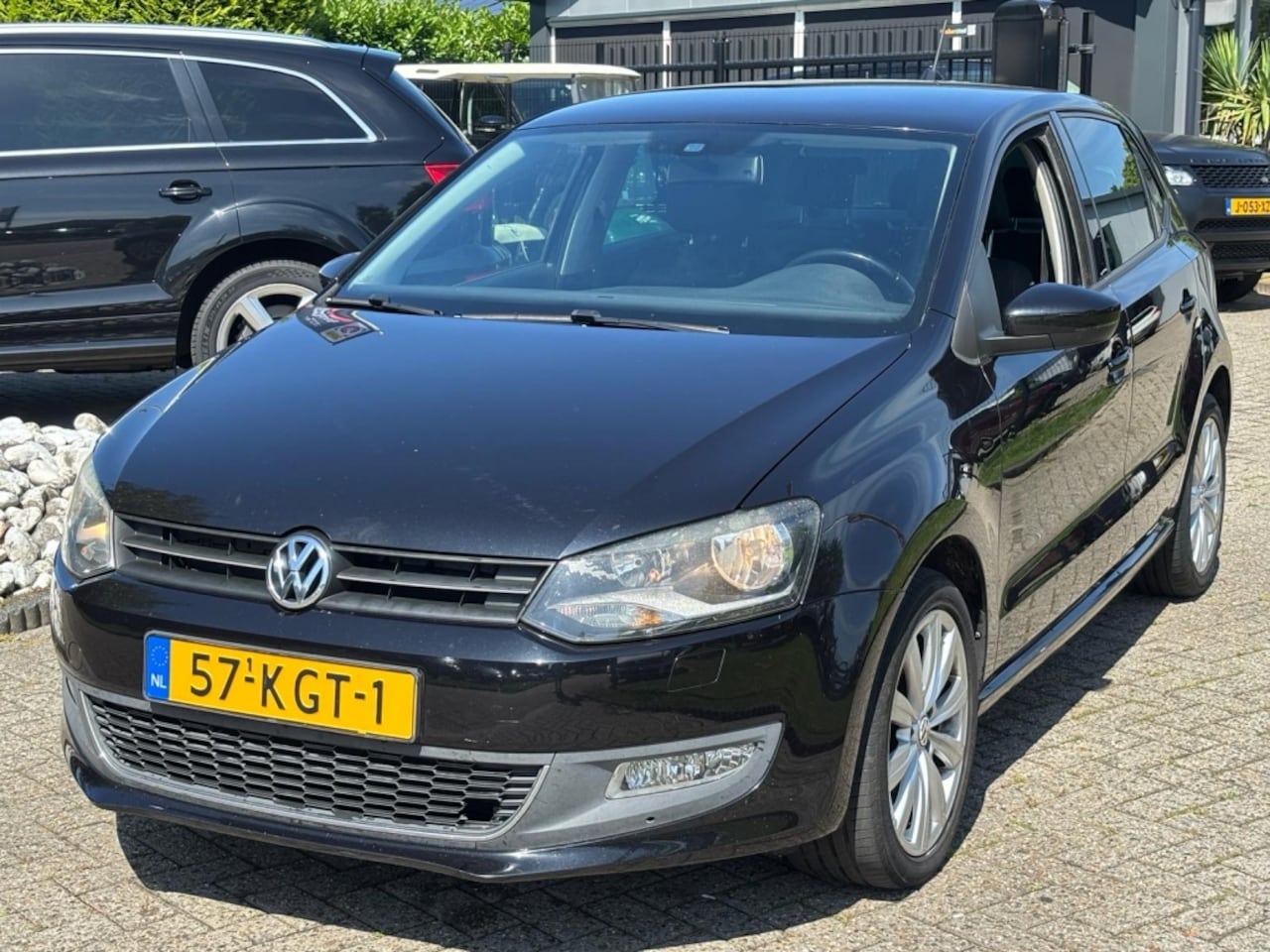 Volkswagen Polo - 1.4 16V Highline Automaat 2009 NW Model Zwart Climate control - AutoWereld.nl