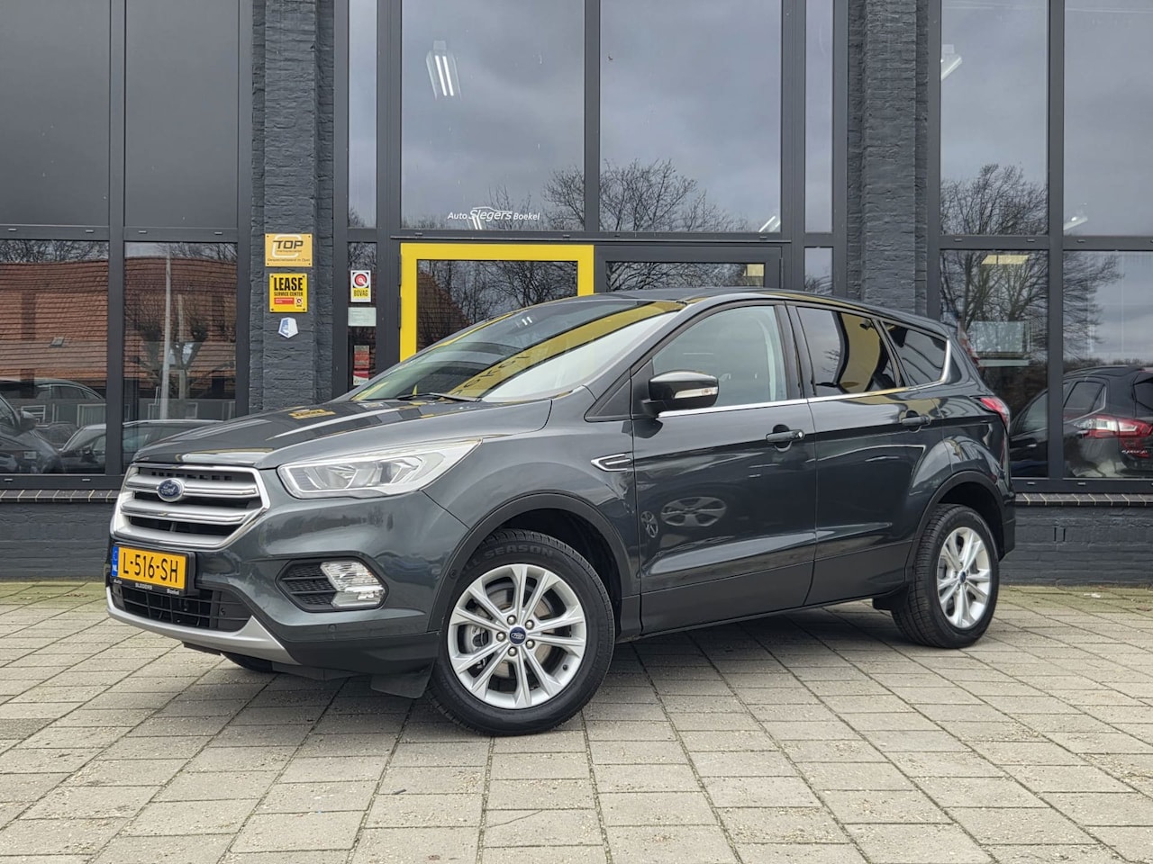 Ford Kuga - 1.5 EcoBoost Titanium | Trekhaak | Panoramadak | Camera + Sensoren | Elektr. Achterkl. | 2 - AutoWereld.nl