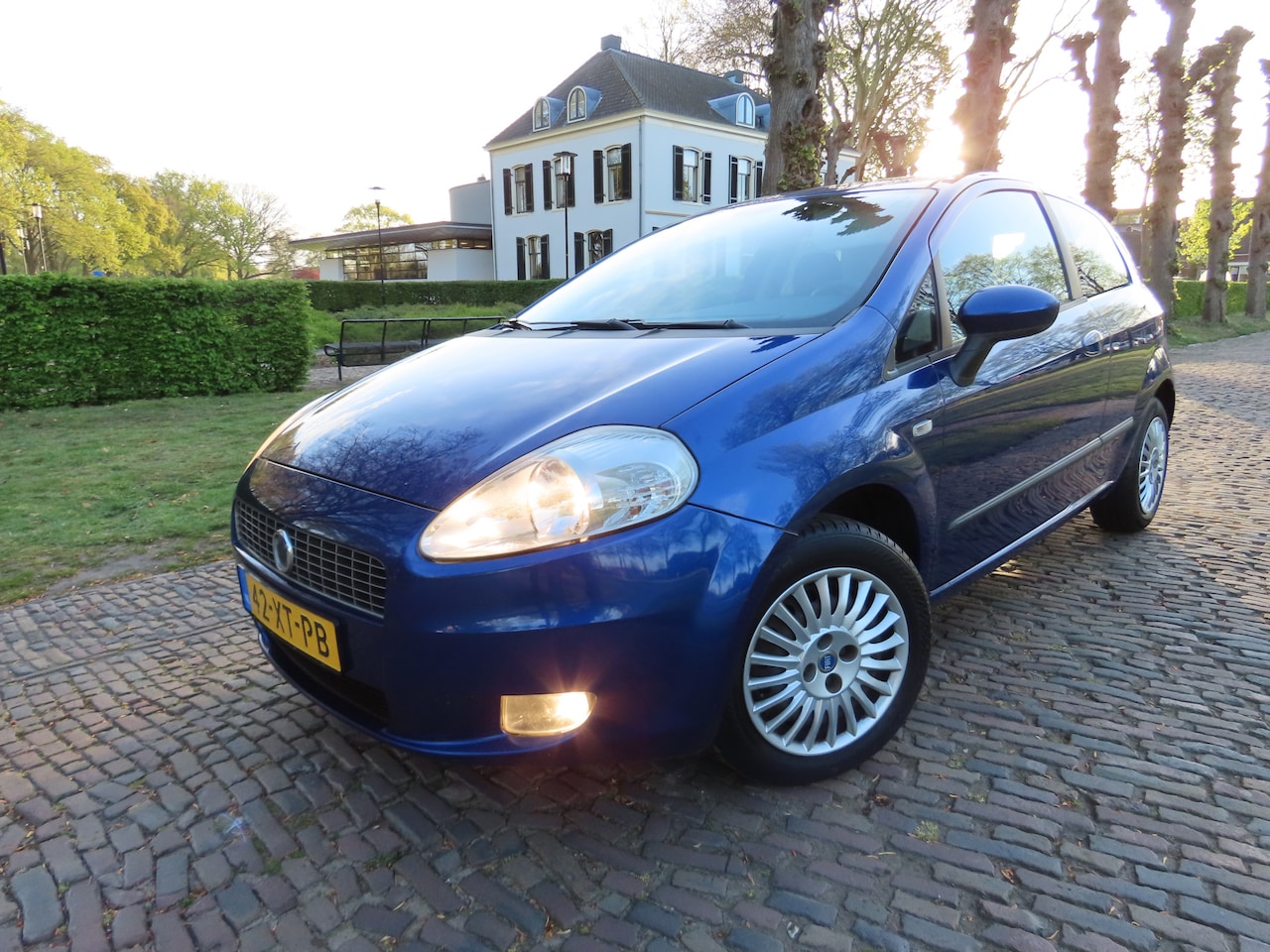 Fiat Grande Punto - 1.4 Dynamic Airco Cruisecontrol Stuurbekrachtiging - AutoWereld.nl