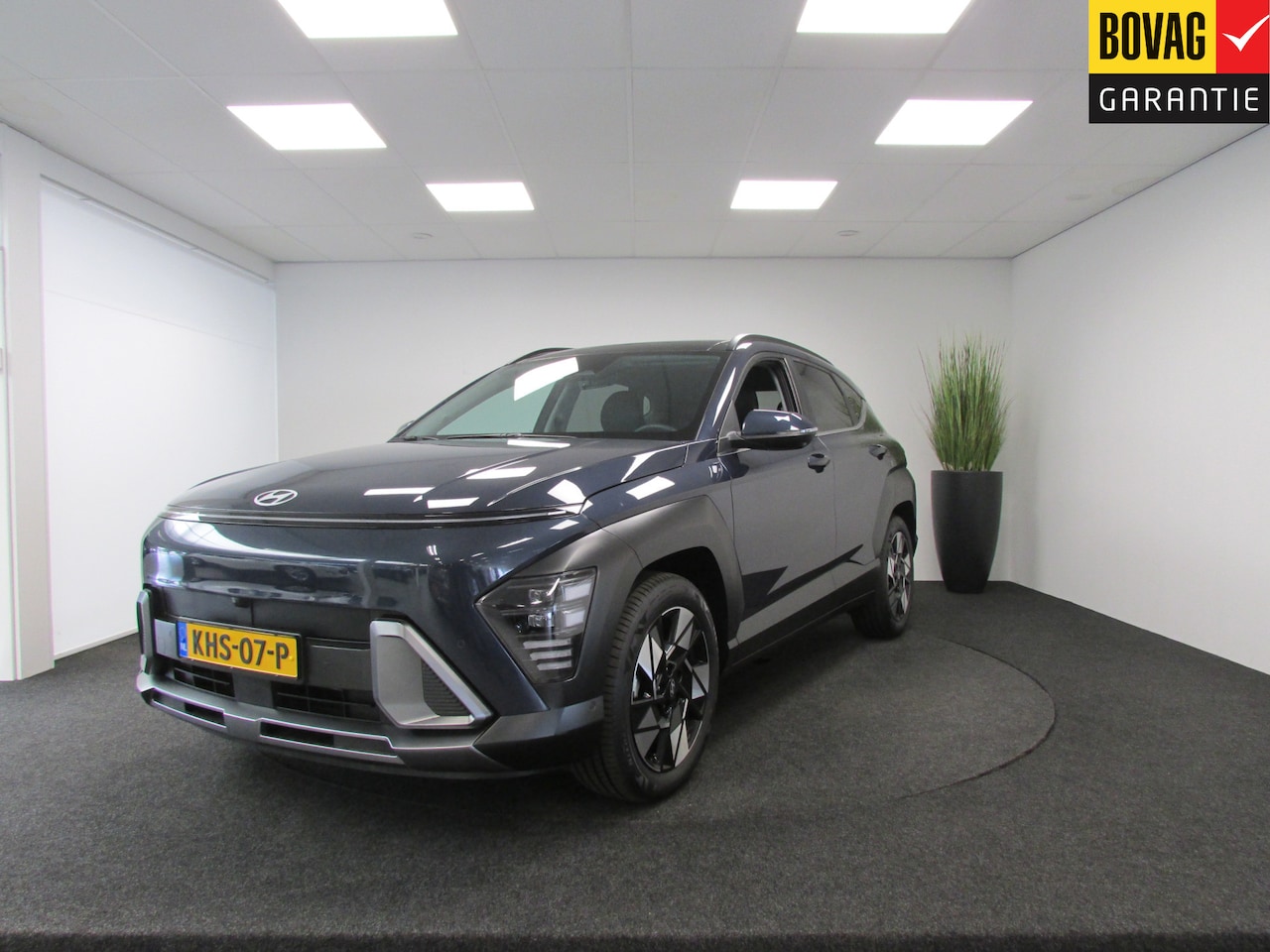 Hyundai Kona - 1.6 GDI HEV I Elektrische stoelen I Sky I Camera rondom I Dodehoekdetectie I - AutoWereld.nl