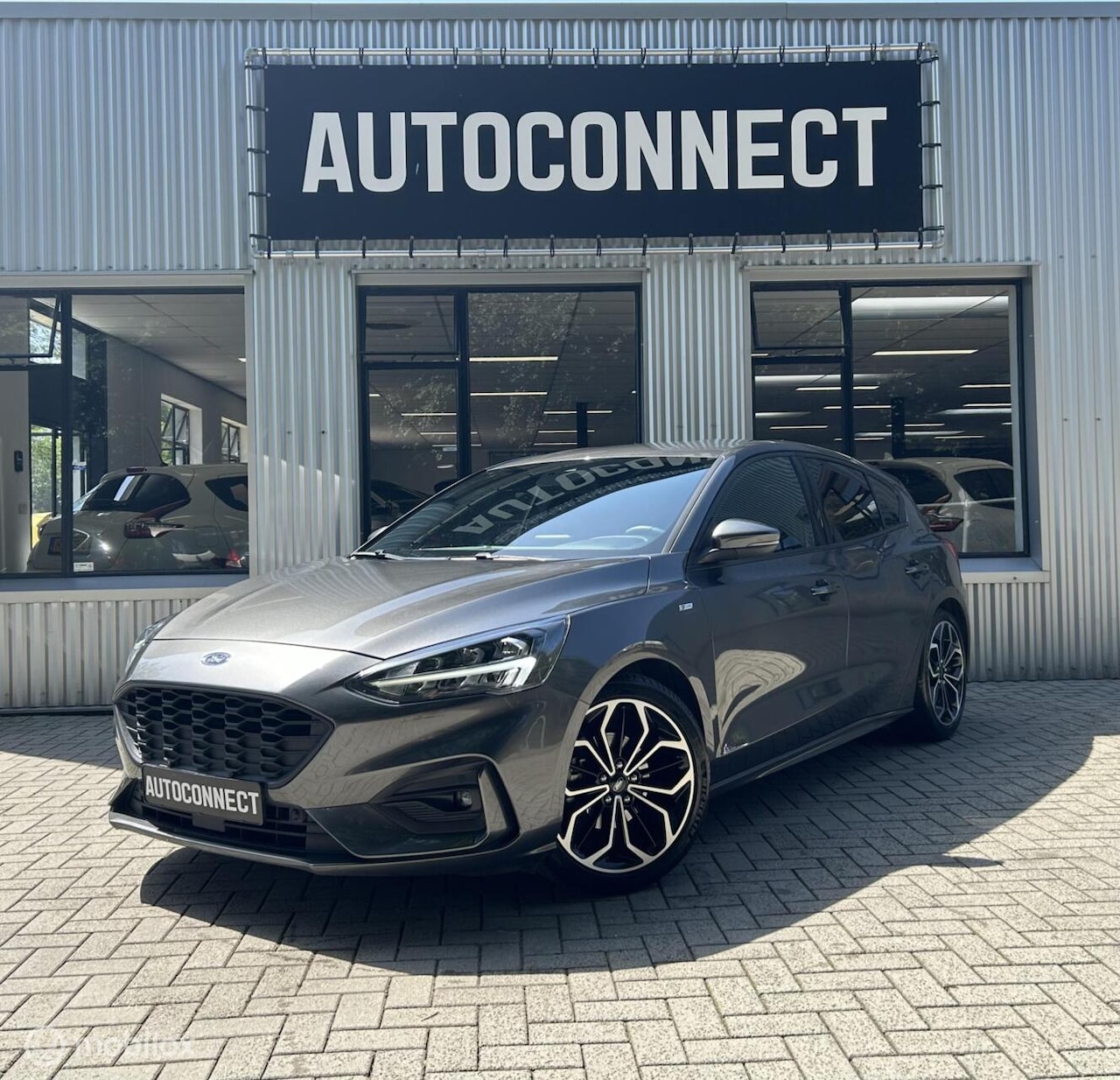 Ford Focus - 1.5 EcoBoost ST Line. AUTOMAAT, NAVI, CRUISE, CLIMA, XENON - AutoWereld.nl