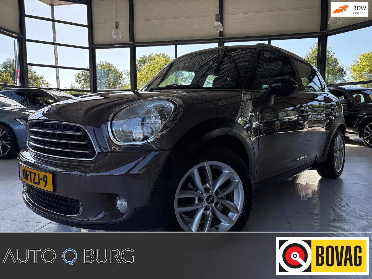 MINI Countryman - 1.6 Cooper Business Line | Stoelverwarming | Leder | Pano | PDC | Airco | Cruise | Navi | - AutoWereld.nl