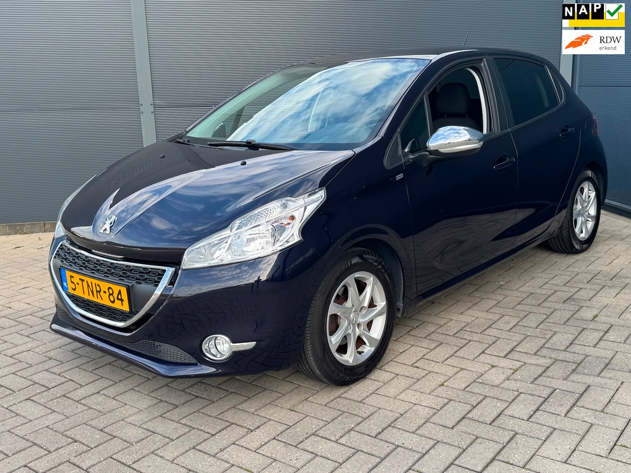 Peugeot 208 - 1.2 VTi Style / Airco / Navi / Nw Riem - AutoWereld.nl