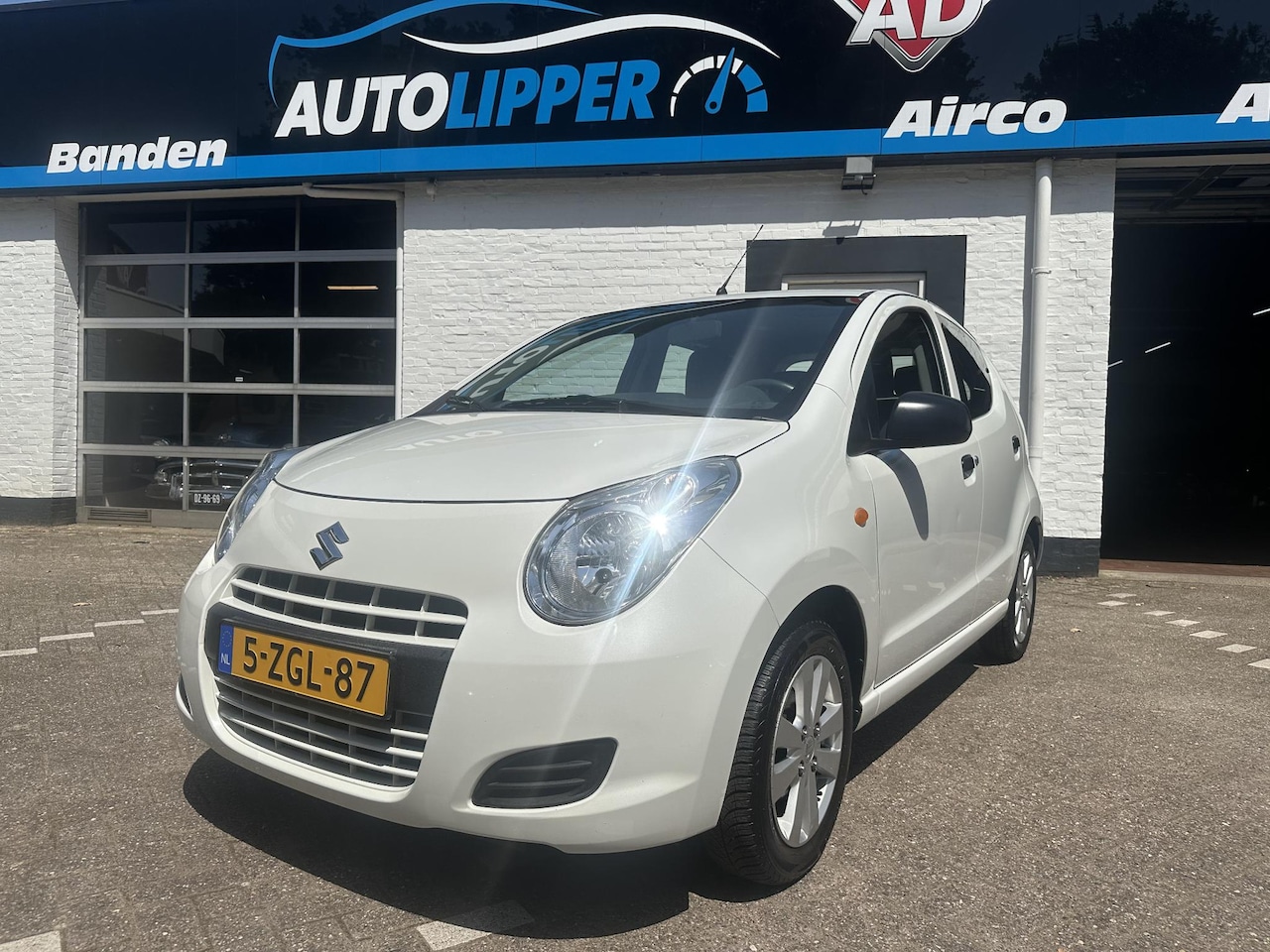 Suzuki Alto - 1.0 Celebration EASSS /Nieuwe apk bij aflevering/Airco/All season banden/Lm velgen/Trekhaa - AutoWereld.nl