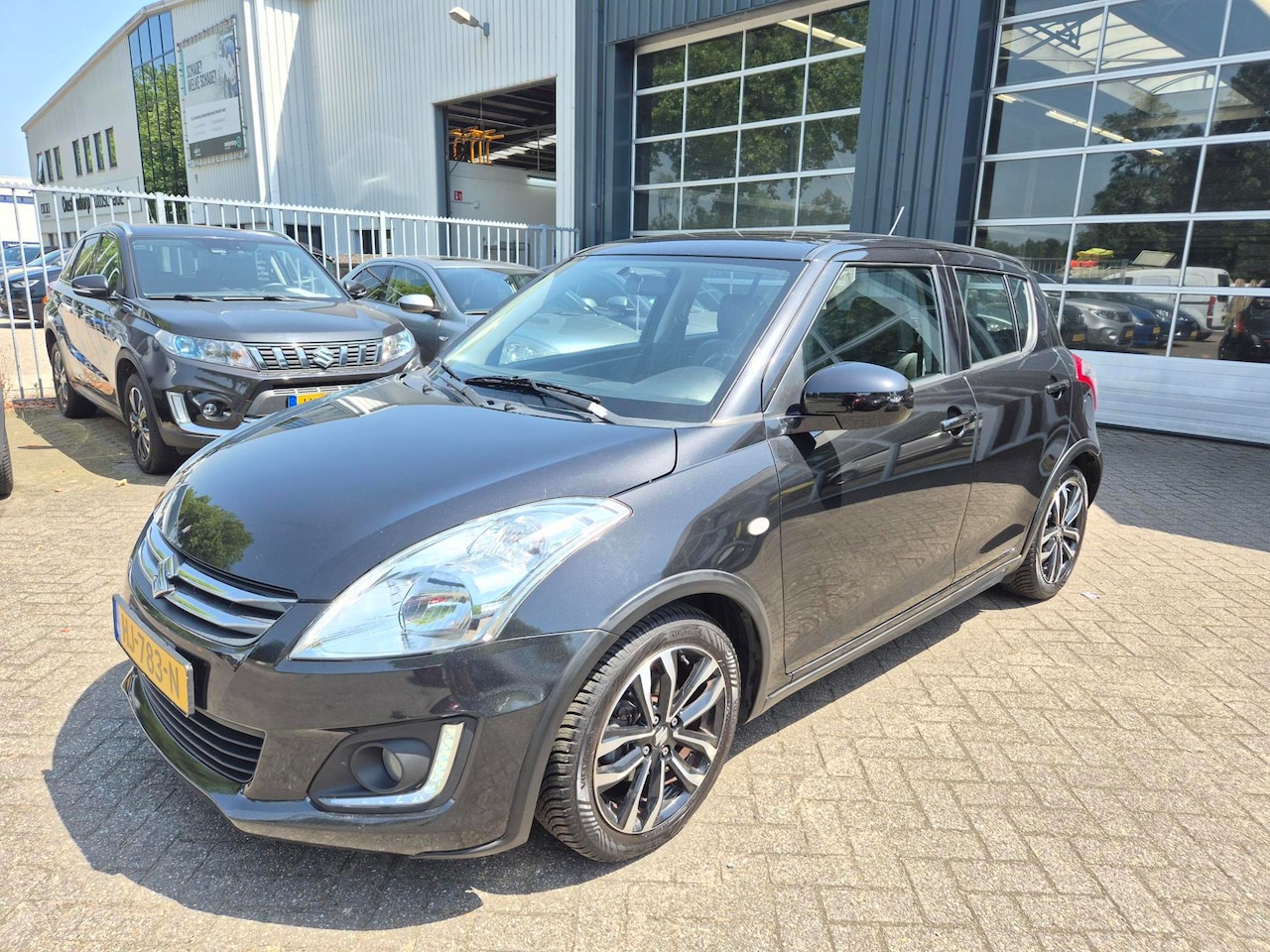 Suzuki Swift - 1.2 Style / 12 mnd garantie / nwe motor - AutoWereld.nl