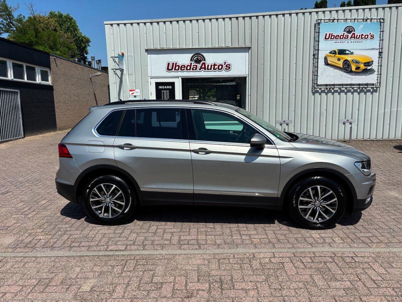 Volkswagen Tiguan - 2.0 TDI Highline-NIEUWSTAAT-AUTOMAAT NIEUW MODEL 14999E - AutoWereld.nl