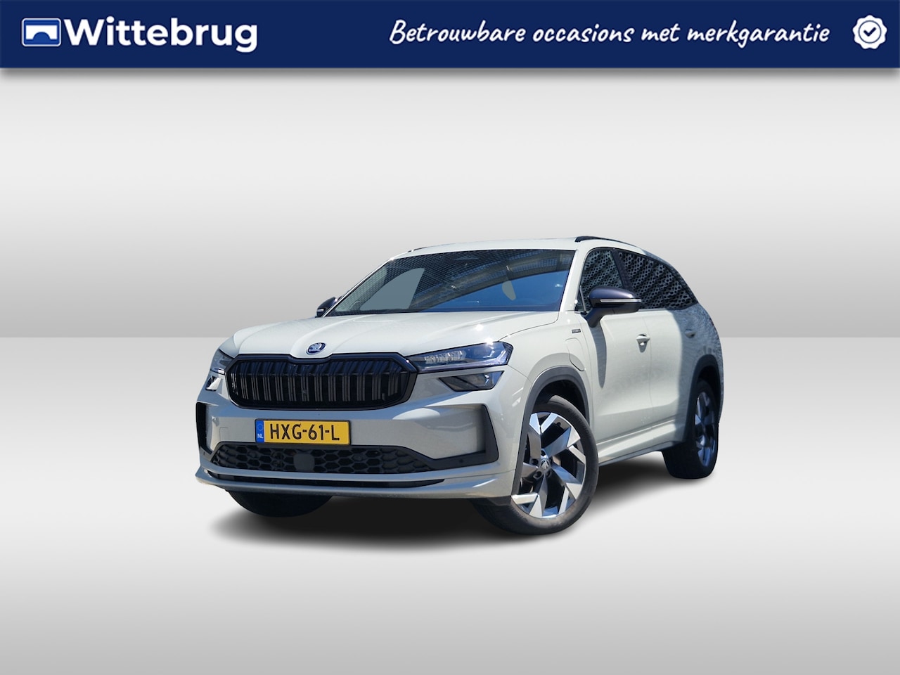 Skoda Kodiaq - 1.5 TSI PHEV Sportline Business / Pan dak / Trekhaak / Winter / Light & View / SK - AutoWereld.nl