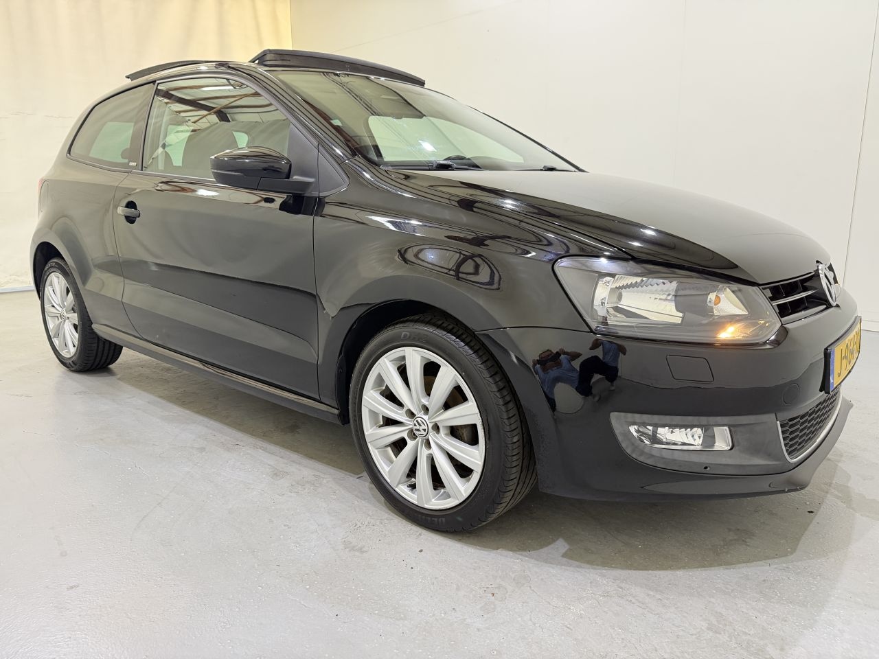 Volkswagen Polo - 1.2 Style Panorama/Airco - AutoWereld.nl