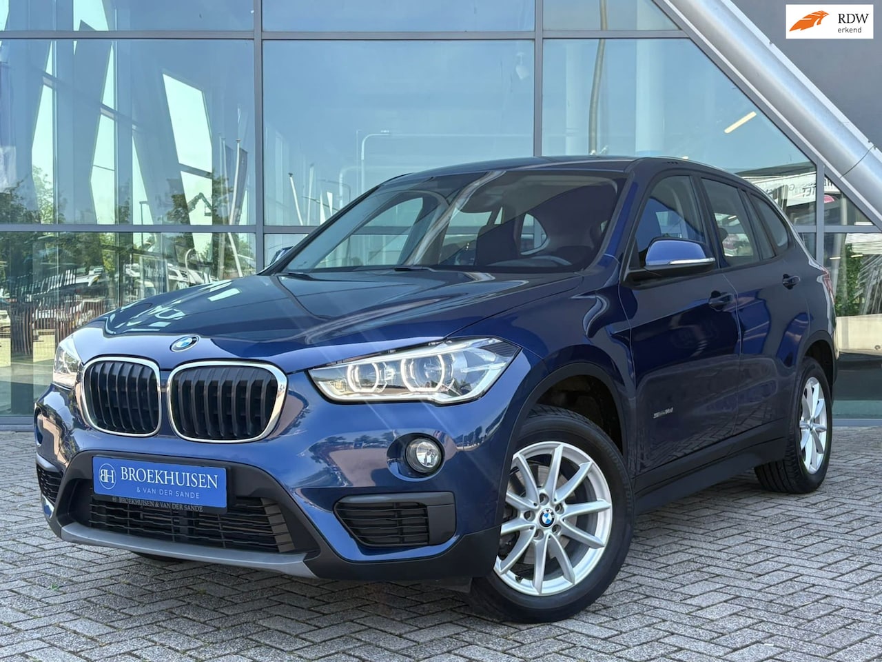 BMW X1 - SDrive18i Centennial High Executive Automaat / Trekhaak / Navigatie - AutoWereld.nl
