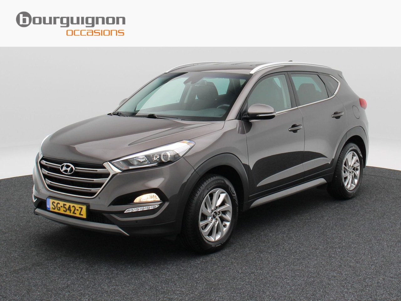 Hyundai Tucson - 1.6 GDi 132Pk Comfort | Stoelverwarming | Trekhaak | Camera | Cruise Control | CarPlay | C - AutoWereld.nl