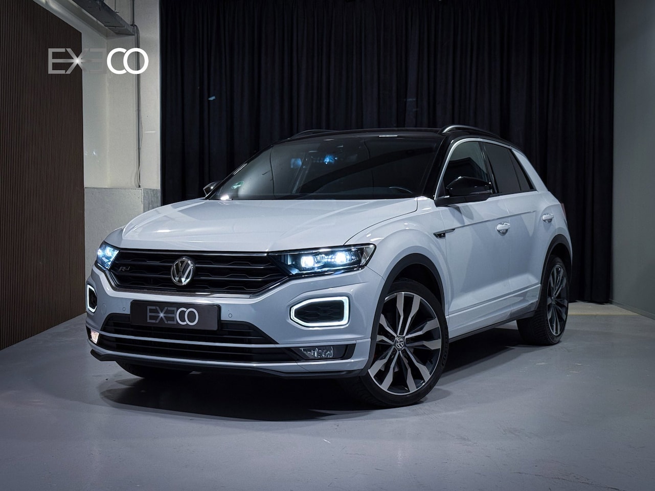 Volkswagen T-Roc - 1.5 TSI Sport Business R-Line |DSG|Virtual|ACC|Camera|Stoelverwarming|Trekhaak|Lane Assist - AutoWereld.nl