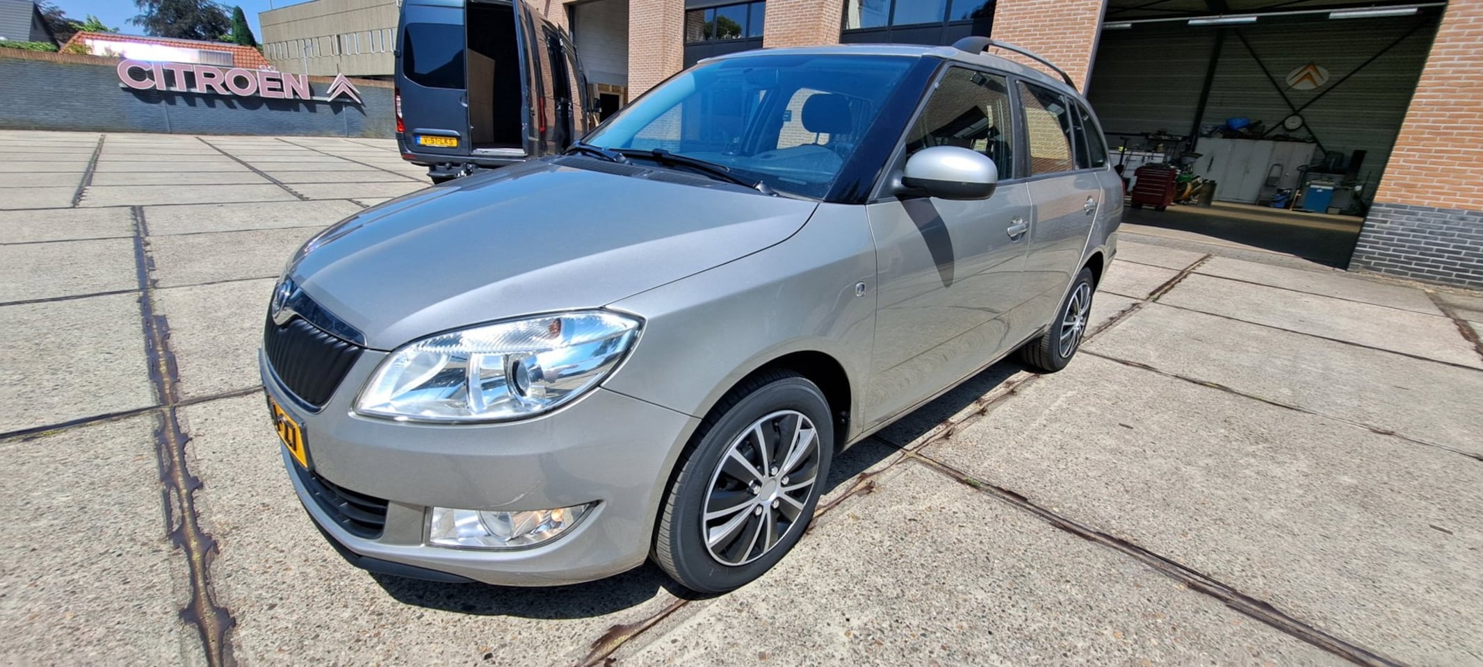 Skoda Fabia Combi - 1.2 TSI 5 DEURS COMDIE NIEUWSTAAT AIRCO NAVAGATIE - AutoWereld.nl