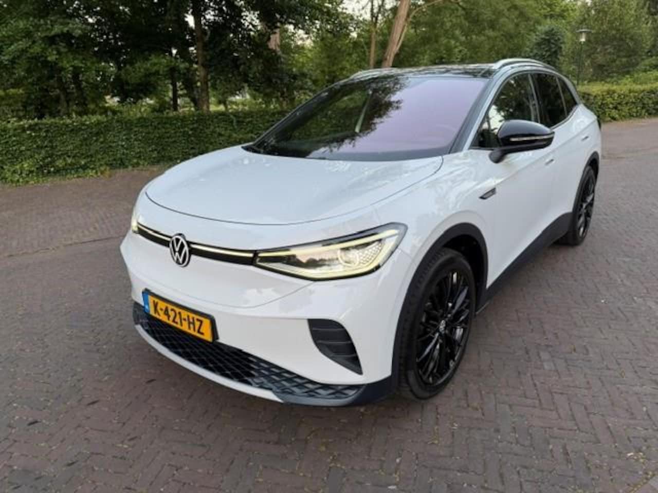Volkswagen ID.4 - Max 77 kWh SOH 87% Warmtepomp/Pano/Acruise/360Camera/Massage/Fabrieksgarantie - AutoWereld.nl