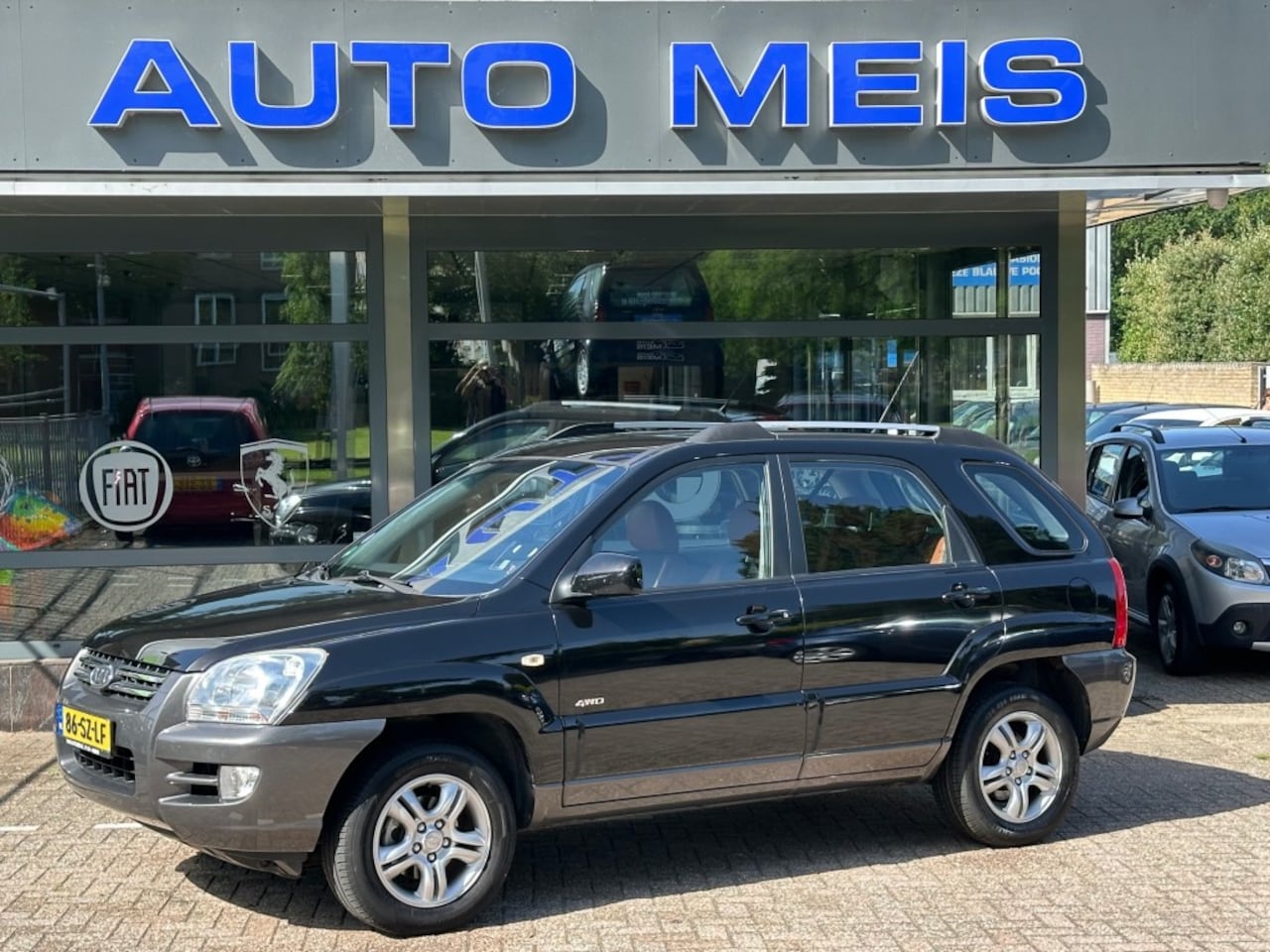 Kia Sportage - 2.7 V6 Adventure 4WD Automaat Leer Airco Cruise Trekhaak - AutoWereld.nl