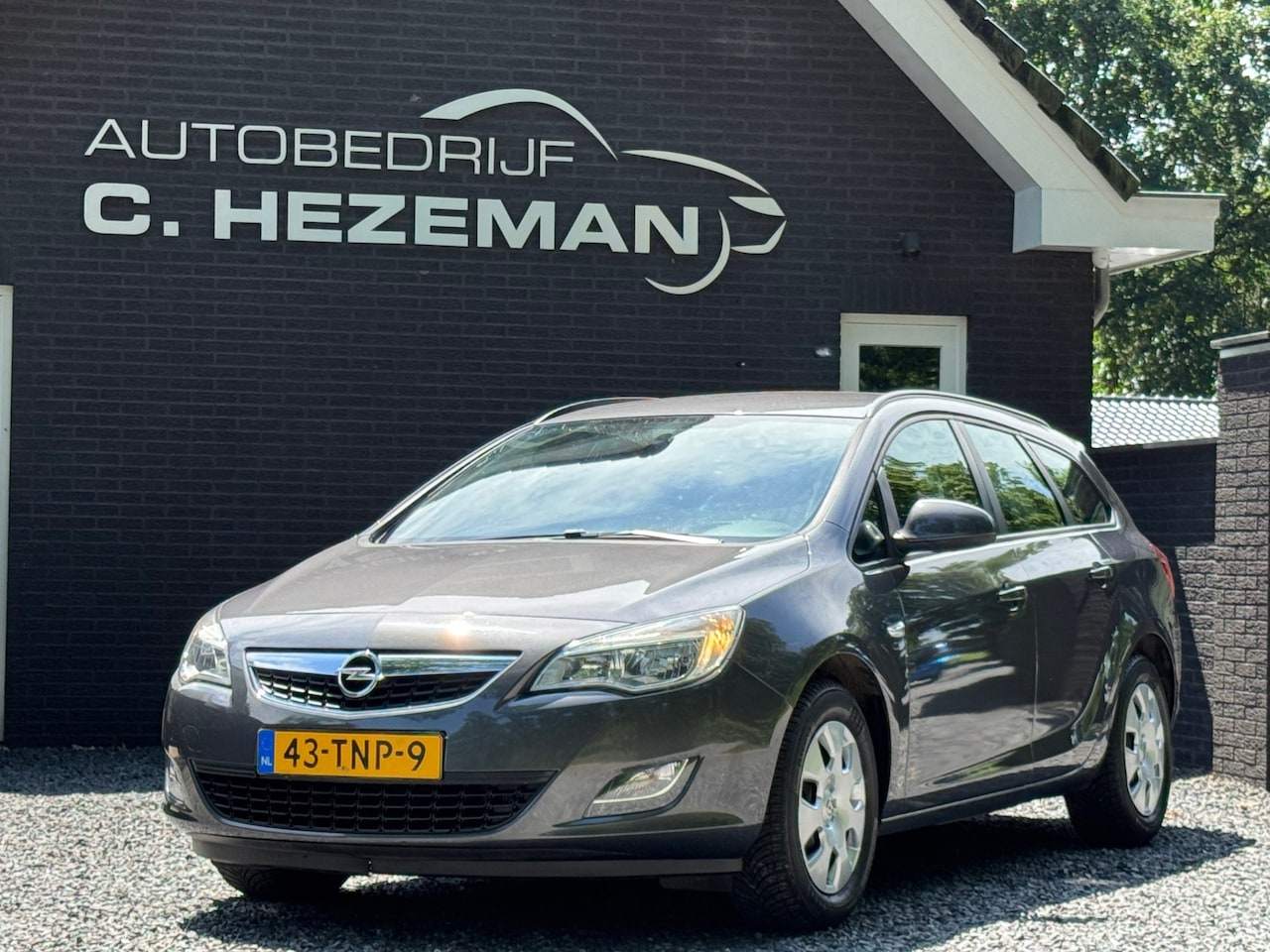 Opel Astra Sports Tourer - 1.4 Business Edition Cruise Control Navigatie Airco Nieuwe APK - AutoWereld.nl