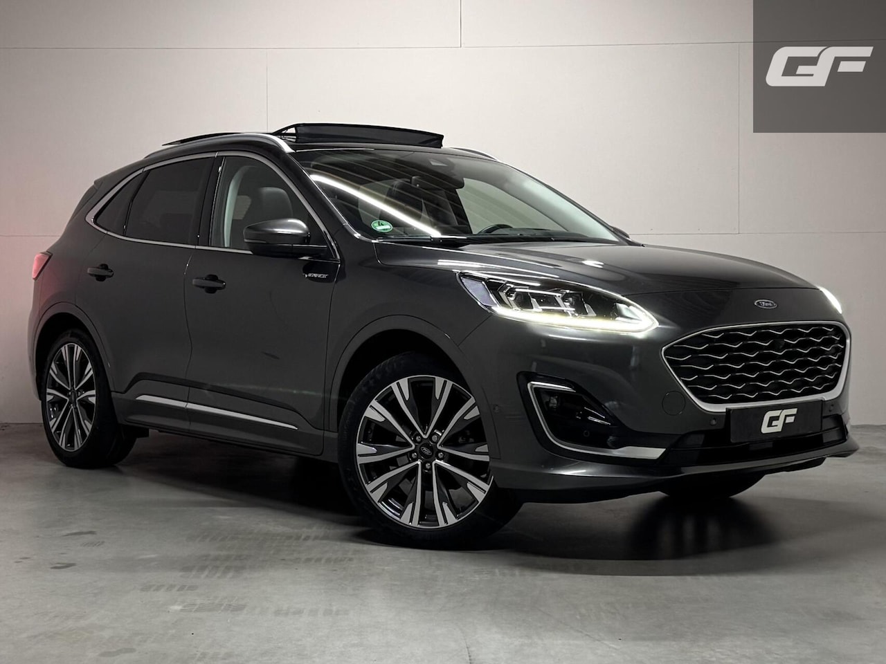 Ford Kuga - 2.5 HEV Vignale 4x4 Pano HUD Leer Trekh. Winterpakket - AutoWereld.nl