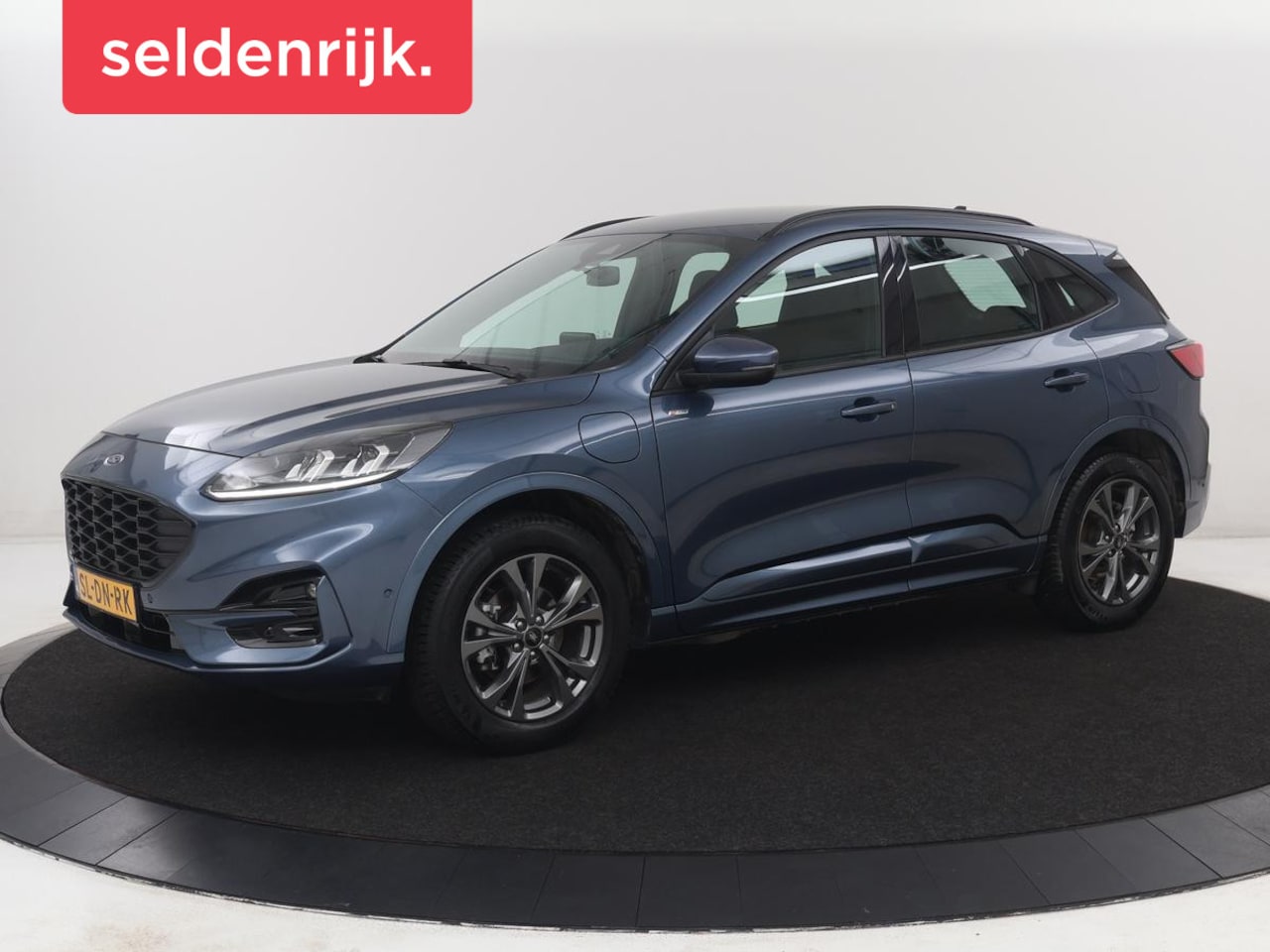 Ford Kuga - 2.5 PHEV ST-Line | SOH 87,2 | Adaptive cruise | Camera | Full LED | Climate control | Dode - AutoWereld.nl