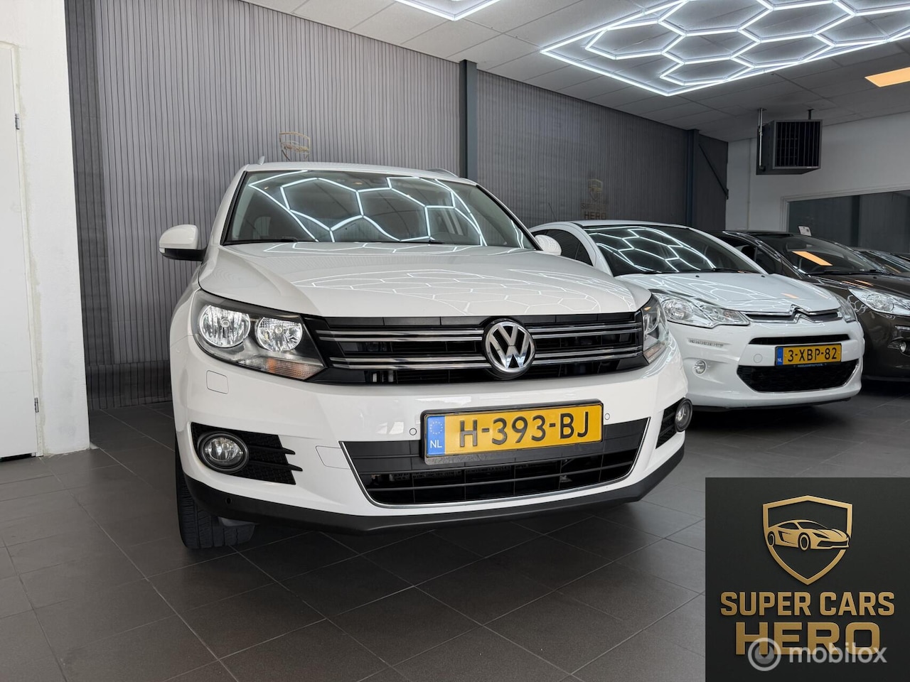 Volkswagen Tiguan - 1.4 TSI Sport&Style - AutoWereld.nl