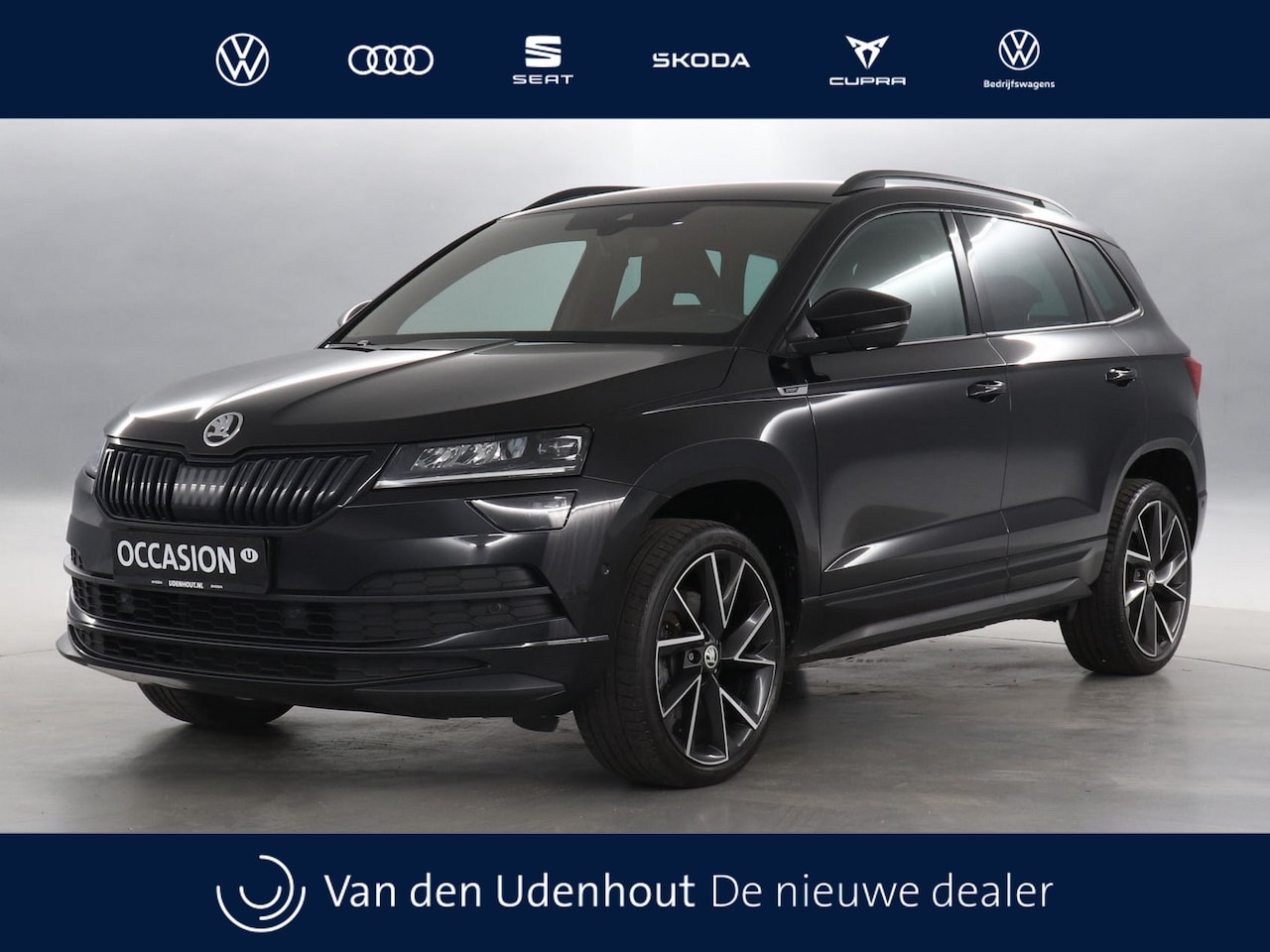 Skoda Karoq - 1.5 TSI 150pk Automaat Sportline Business / Trekhaak / 19 inch l.m. / Travel Assist - AutoWereld.nl