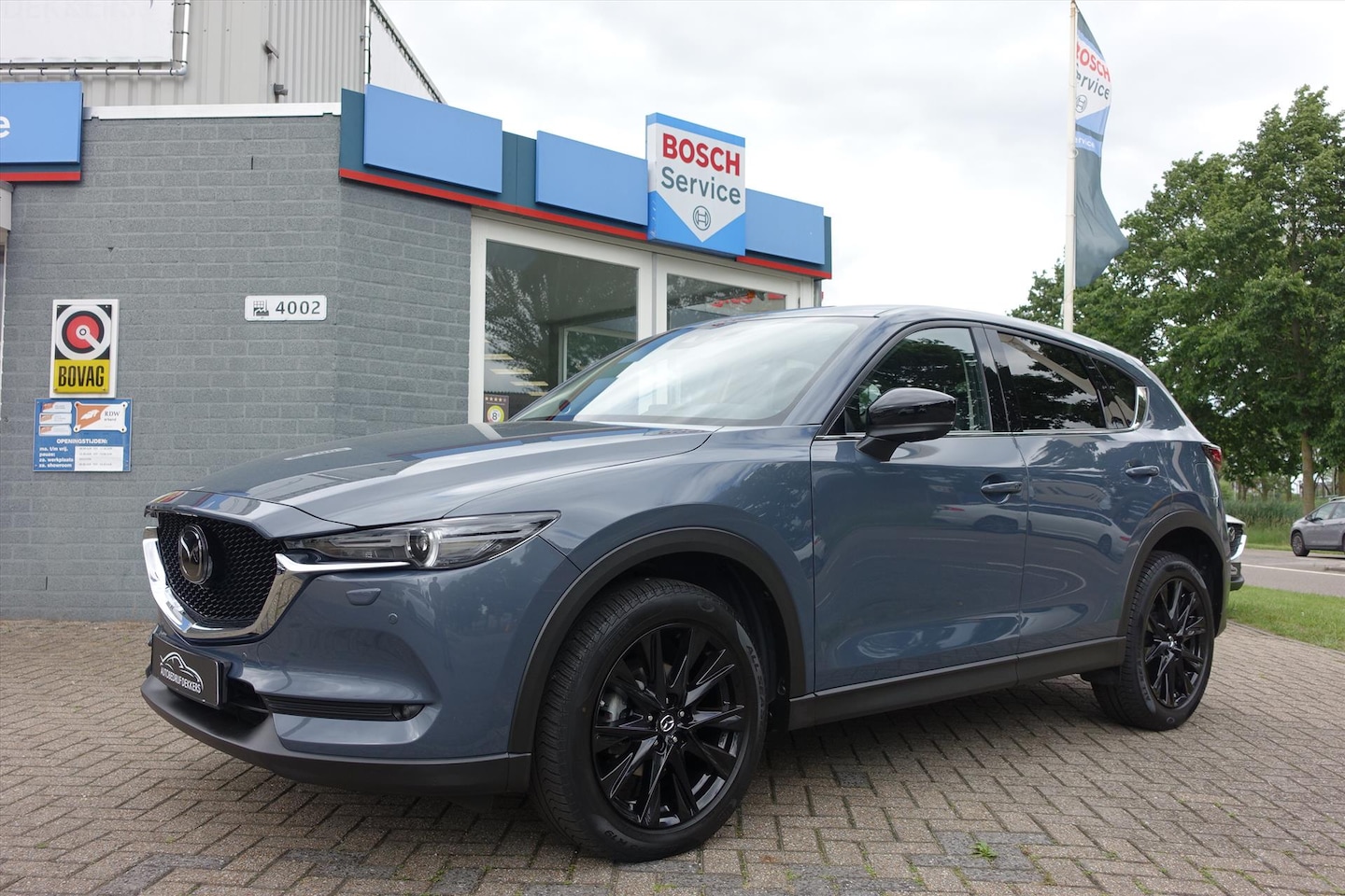 Mazda CX-5 - 2.5 SKYACTIV-G 194pk 4WD Aut Sportive | HEAD UP | BOSE | KEYLESS | 360 CAM - AutoWereld.nl