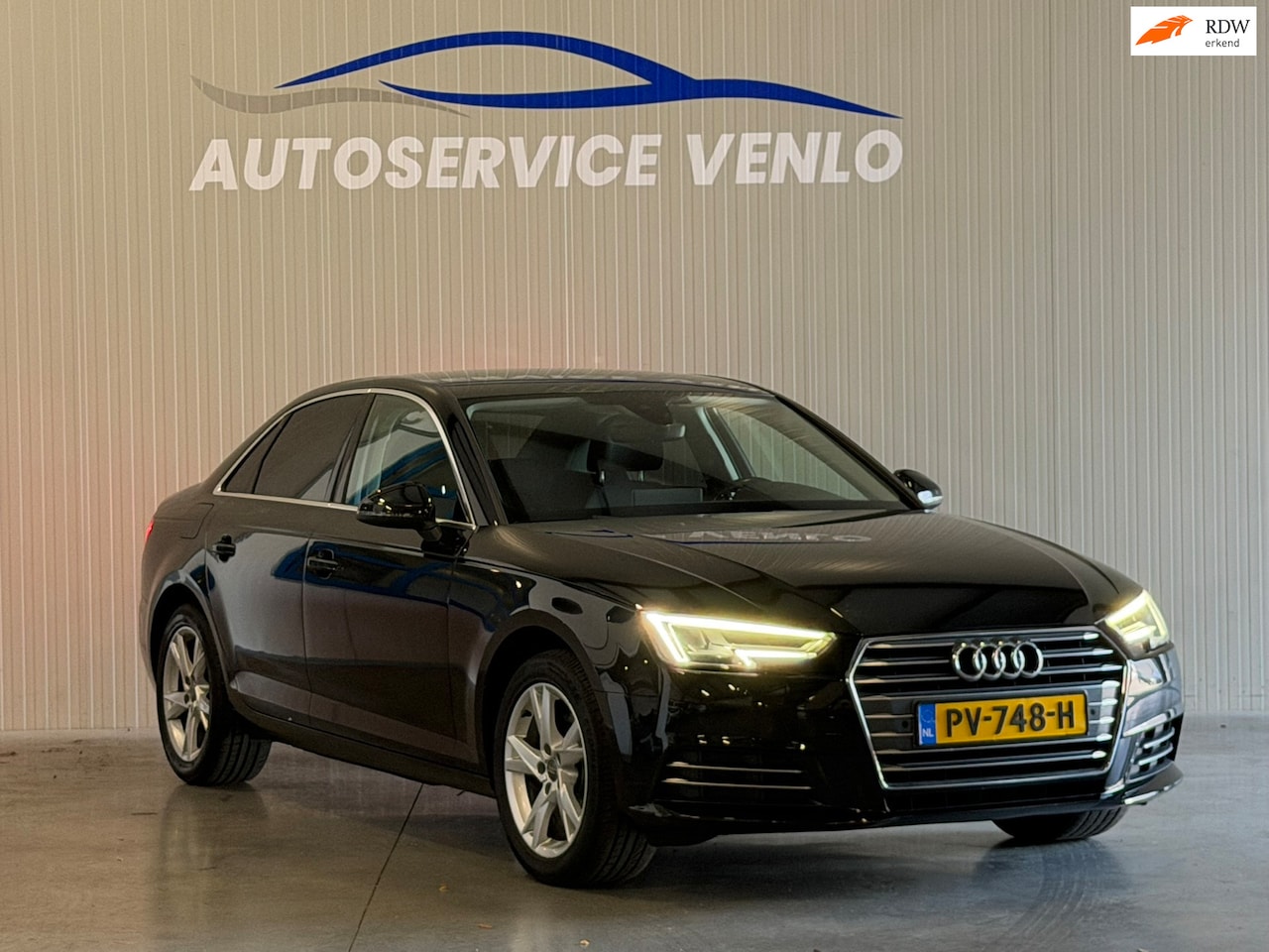 Audi A4 Limousine - 1.4 TFSI Sport Lease Edition Zwart | Virtual cockpit | Sedan - AutoWereld.nl