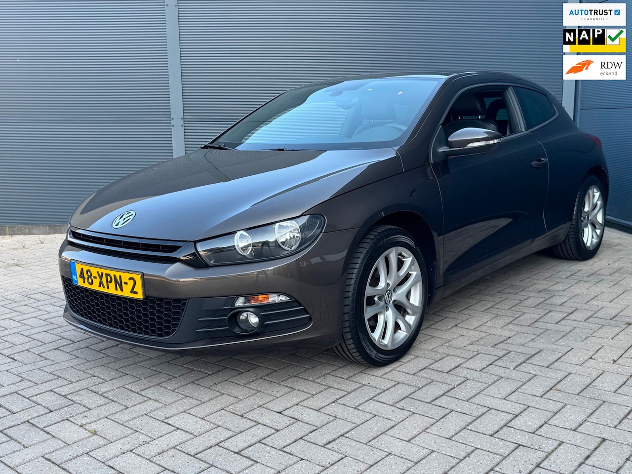 Volkswagen Scirocco - 1.4 TSI Highline / Navi / Nap / Pano - AutoWereld.nl
