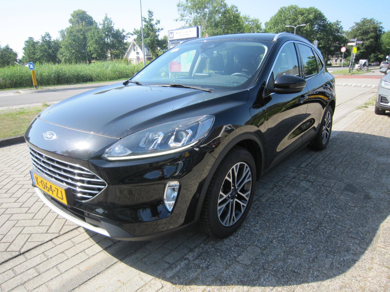 Ford Kuga - 2.5 PHEV Titanium aut trekh - AutoWereld.nl