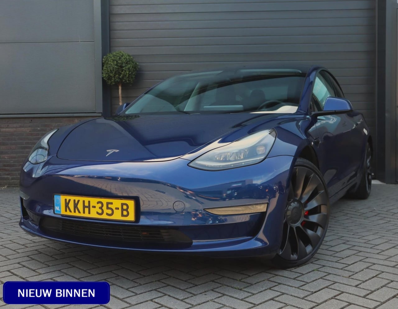 Tesla Model 3 - Performance AWD 75 kWh | 87% SOH | Stoel en achterbank verwarming - AutoWereld.nl