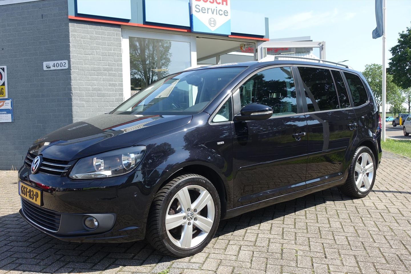 Volkswagen Touran - 1.4 TSI 140pk Comfortline 7P | NAVI | VAST GLAZEN DAK | TREKHAAK - AutoWereld.nl