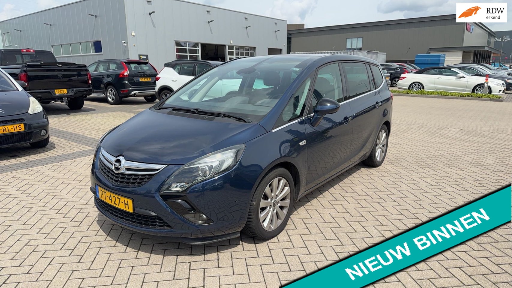 Opel Zafira Tourer - 1.4 Cosmo 120pk 7-Persoons Clima Cruise Navi Historie - AutoWereld.nl
