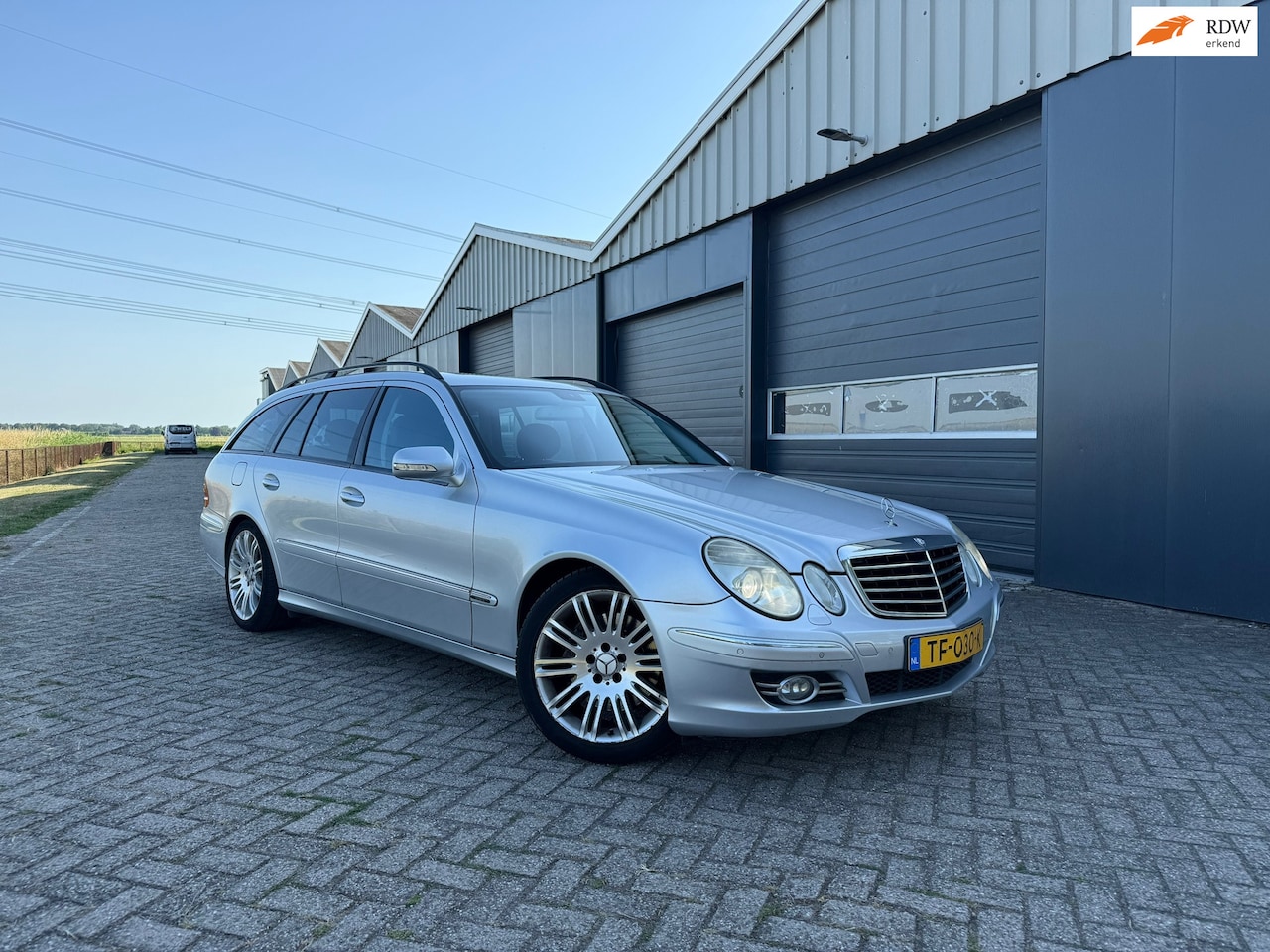Mercedes-Benz E-klasse Estate - 200 K. Avantgarde Pano/Automaat/AC/Navi - AutoWereld.nl