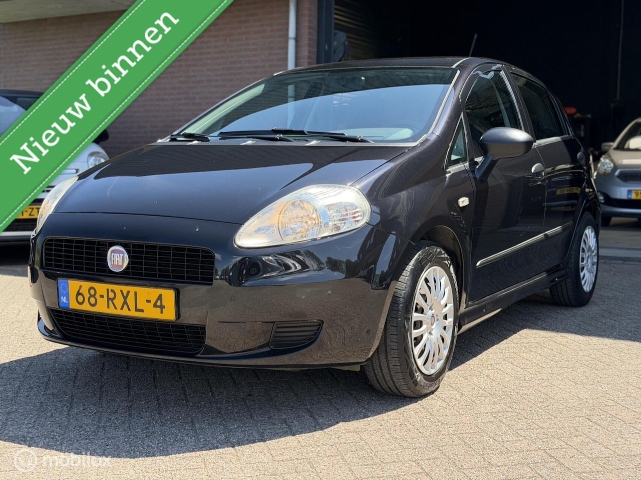 Fiat Grande Punto - 1.2 Actual DEALER OH|AIRCO|5 DRS|LAGE KM!! - AutoWereld.nl