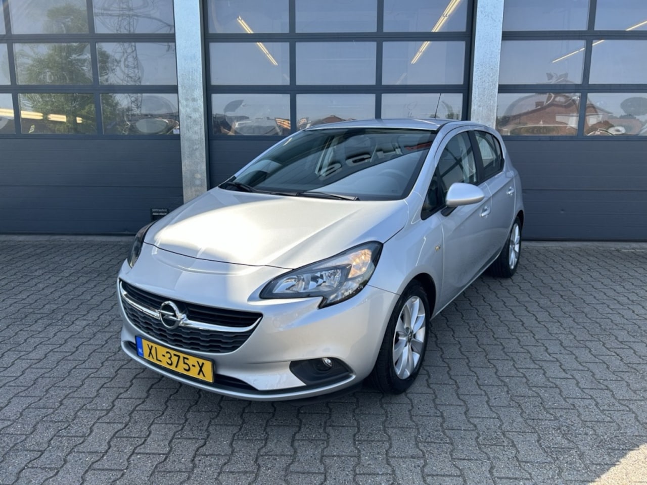 Opel Corsa - 1.4 Favourite 1.4 90pk 5-drs Favourite - AutoWereld.nl