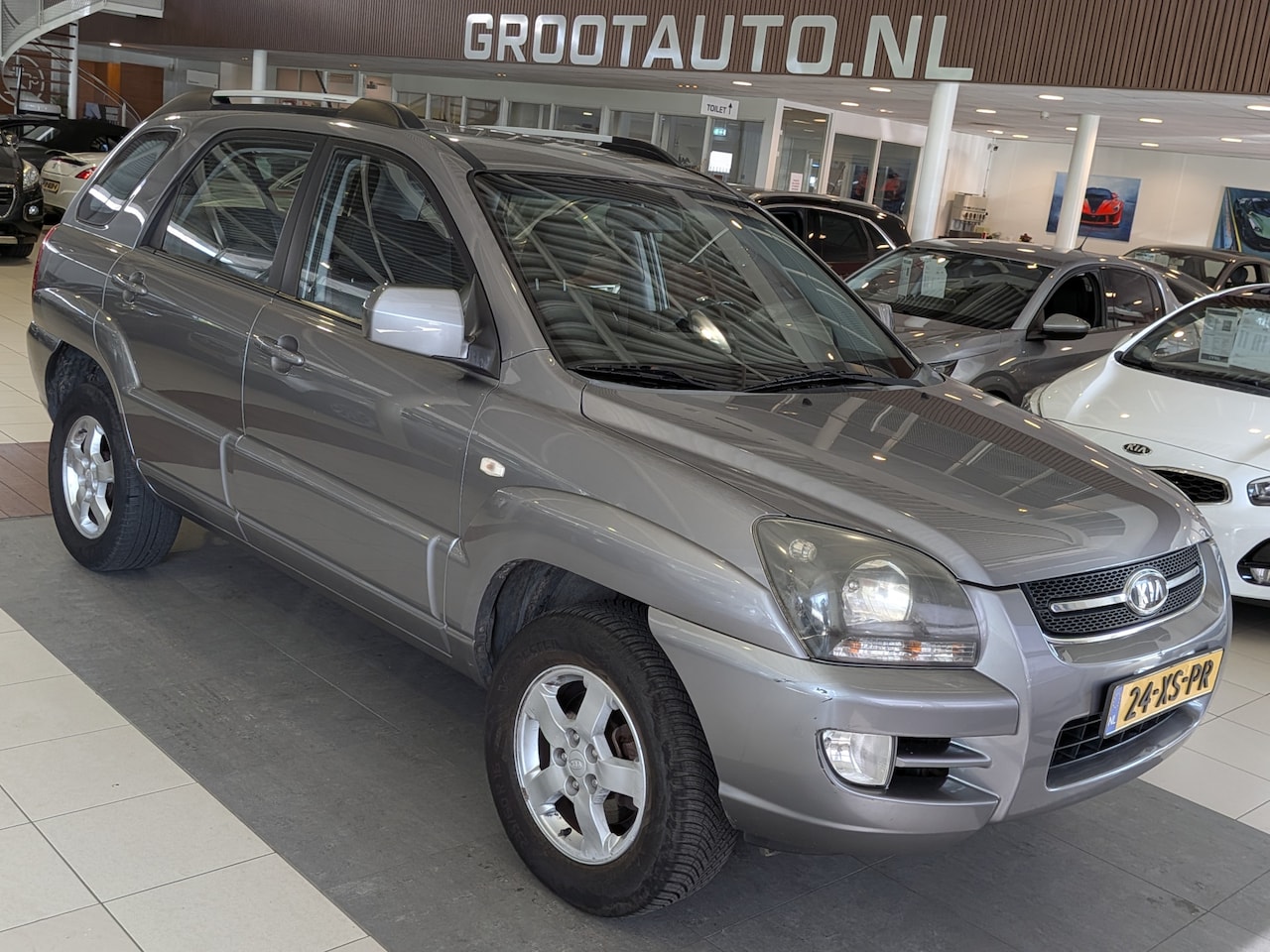 Kia Sportage - 2.0 CVVT X-ecutive Airco, Cruise Control, Trekhaak, Stuurbekrachtiging - AutoWereld.nl