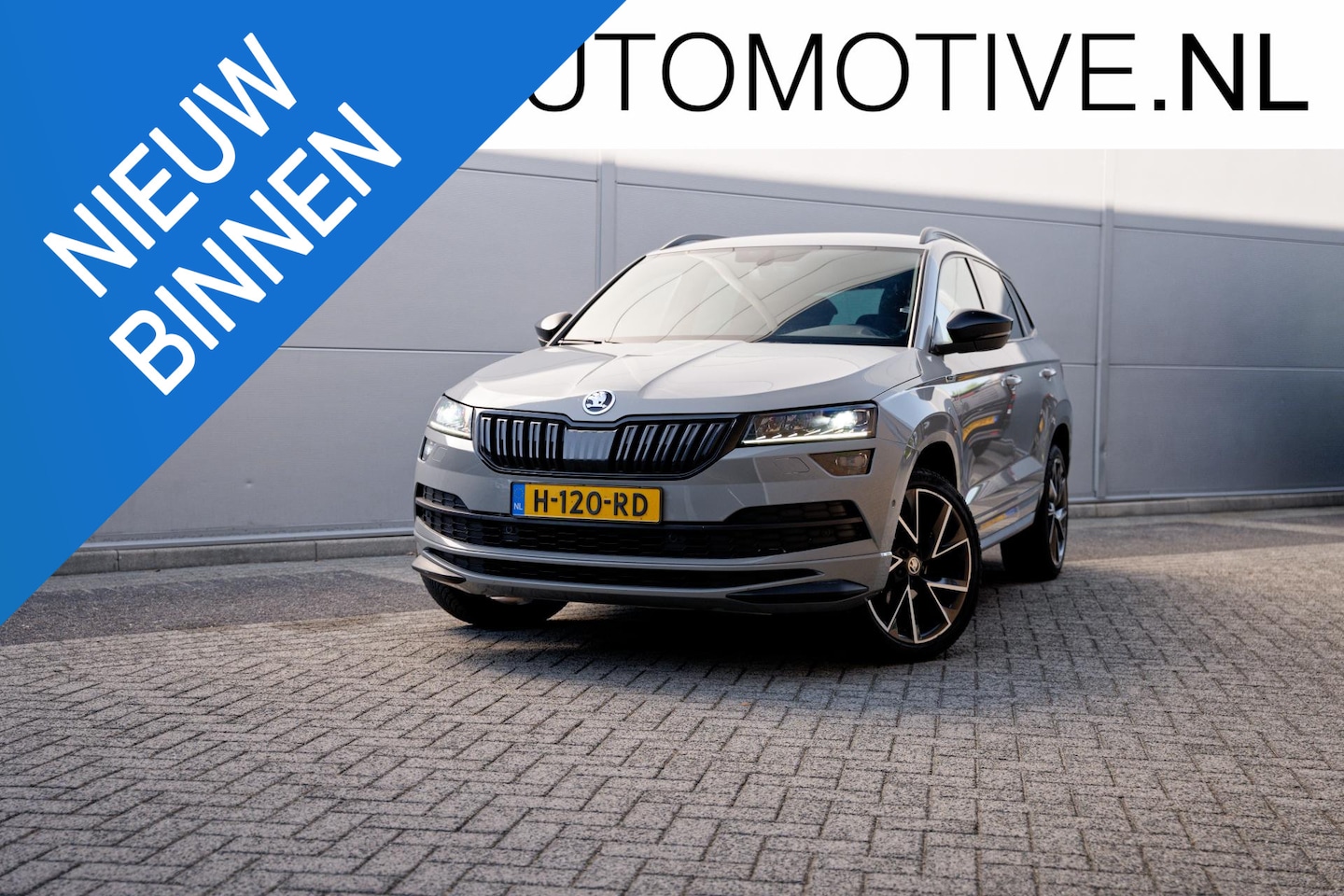 Skoda Karoq - 1.5 TSI ACT Sportline Business 19" LM  velgen, Sound System, Verwarmbare stoelen, criose c - AutoWereld.nl