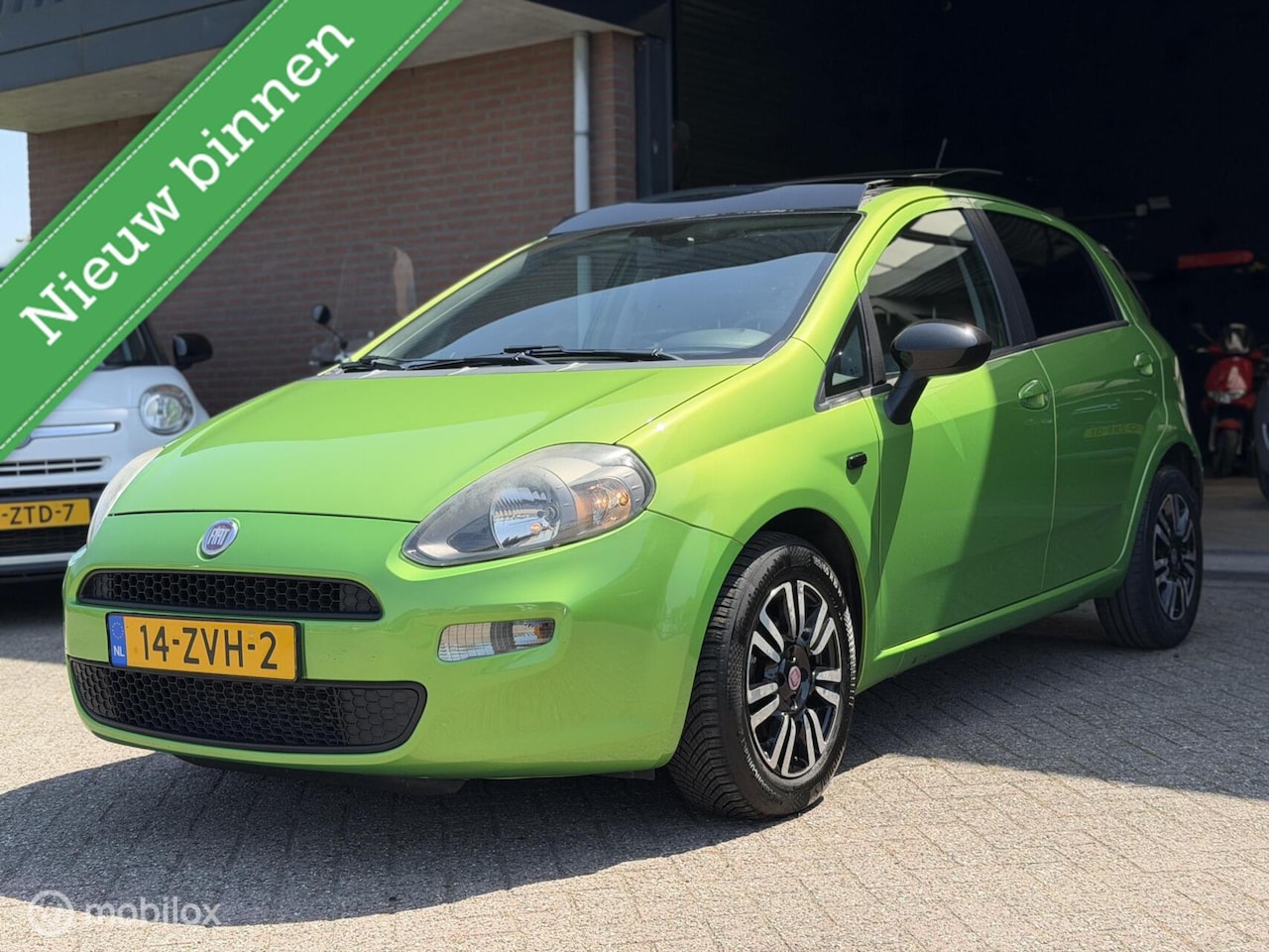 Fiat Punto Evo - 0.9 TwinAir Lounge PANODAK|5 DRS|AIRCO|6 BAK!! - AutoWereld.nl