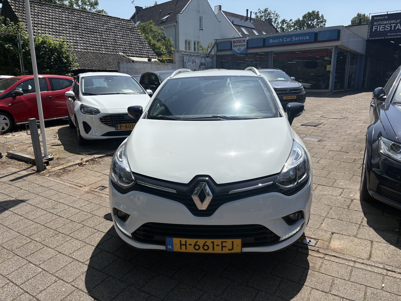 Renault Clio Estate - 0.9 TCe Limited Mooie complete auto met navigatie en cruise control en een trekhaak - AutoWereld.nl