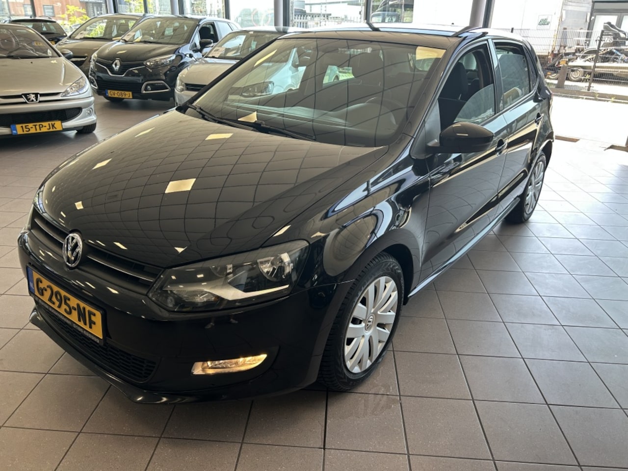 Volkswagen Polo - 1.2-12V Bl.M.Trendl. Climate 176 DKM BJ 2011 !!! - AutoWereld.nl