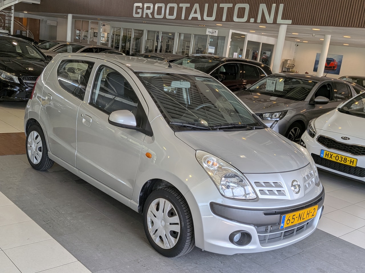 Nissan Pixo - 1.0 Look NAP 35.446km, Airco, Stuurbekrachtiging - AutoWereld.nl