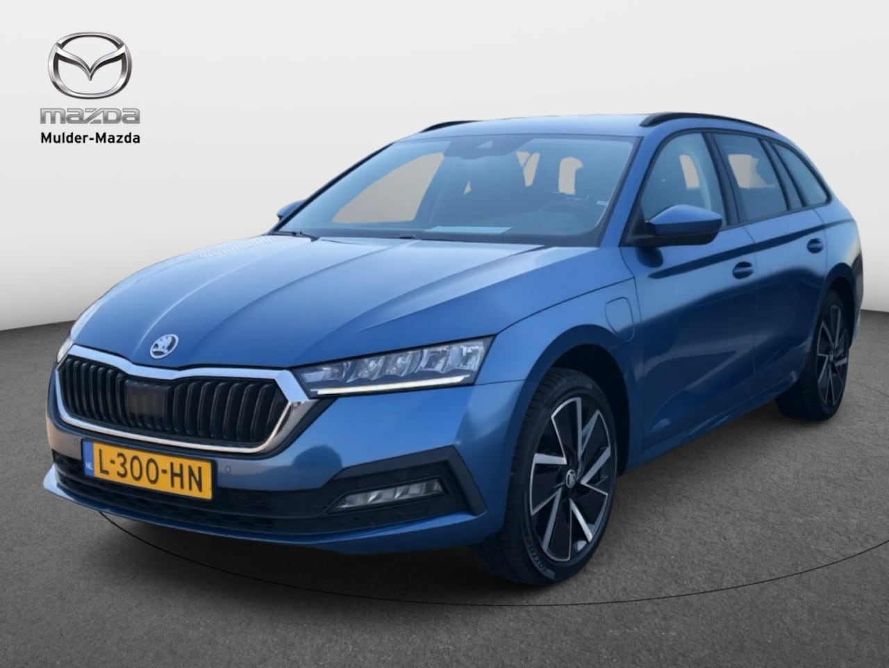 Skoda Octavia Combi - 1.4 TSI iV Business Edition Aut | Carplay | 93.3% SOH - AutoWereld.nl
