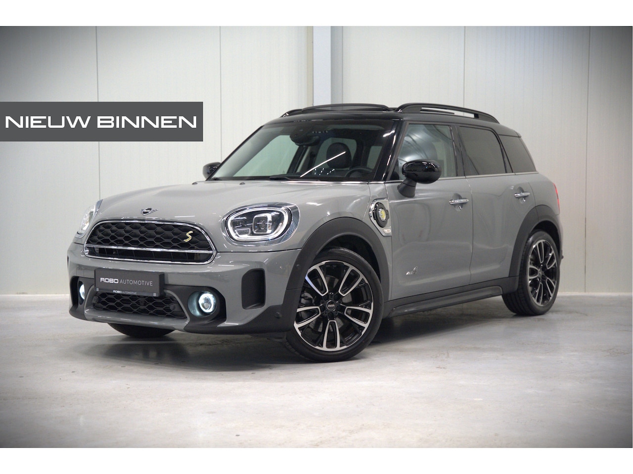 MINI Countryman - 1.5 Cooper S E ALL4 Chili | Panoramadak | Stoelverwarming | Stuurverwarming | Head-Up Disp - AutoWereld.nl
