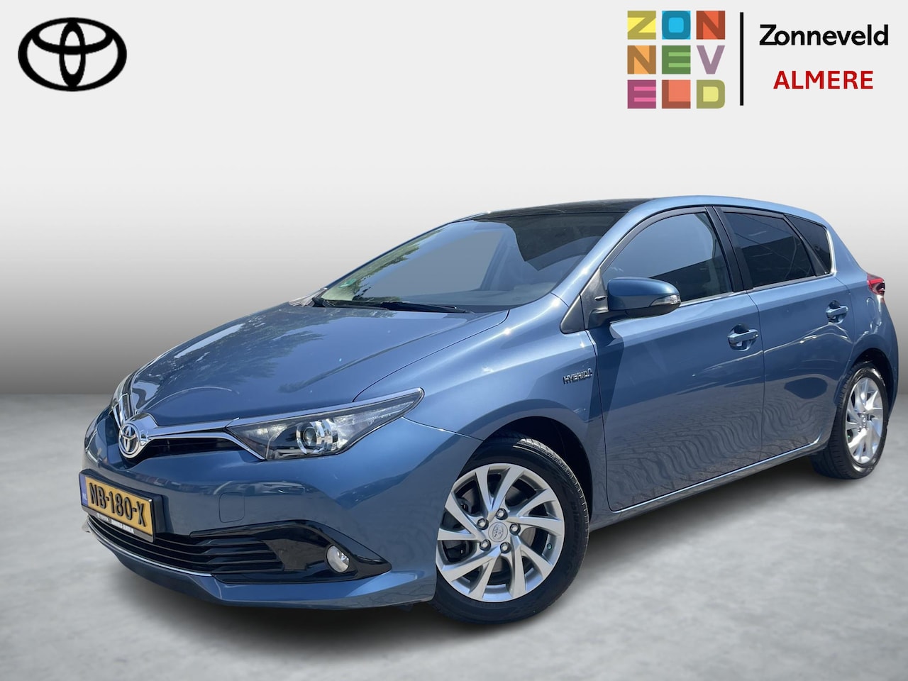Toyota Auris - 1.8 Hybrid Trend Panoramadak - AutoWereld.nl