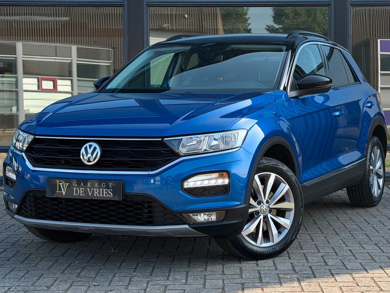 Volkswagen T-Roc - 1.5 TSI Style ACC CarPlay Navi Trekhaak Garantie - AutoWereld.nl