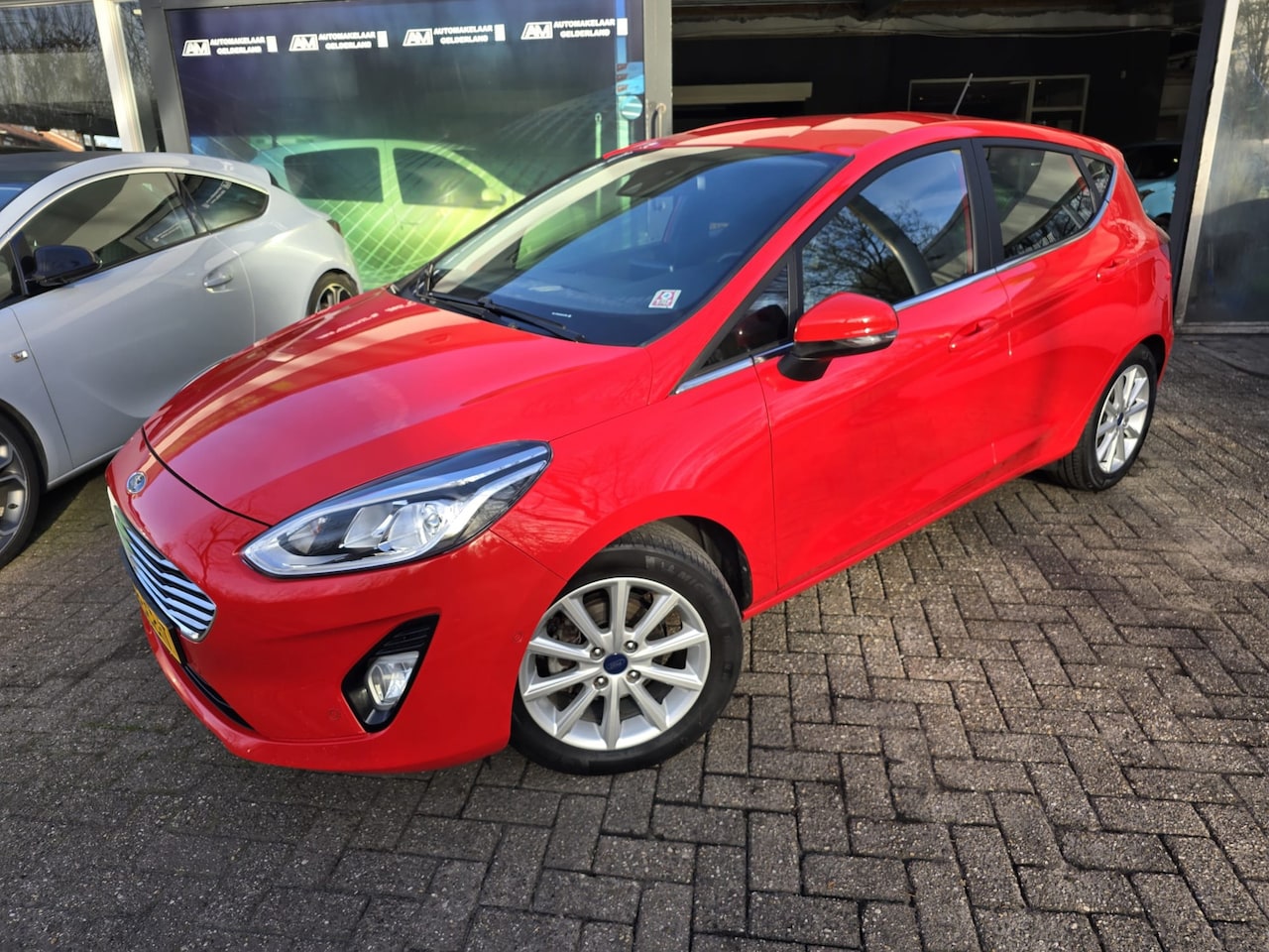 Ford Fiesta - 1.0 EcoBoost Titanium | 2E EIGENAAR | 12 MND GARANTIE | NAVI | CRUISE | NL AUTO | - AutoWereld.nl