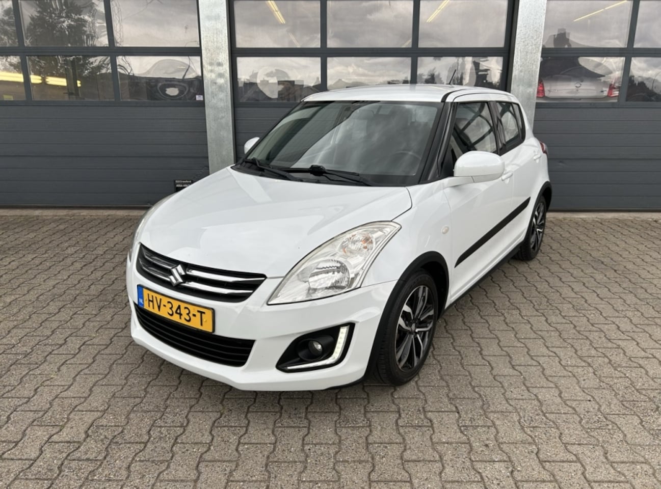 Suzuki Swift - 1.2 VVT 90pk S&S 5D Style - AutoWereld.nl