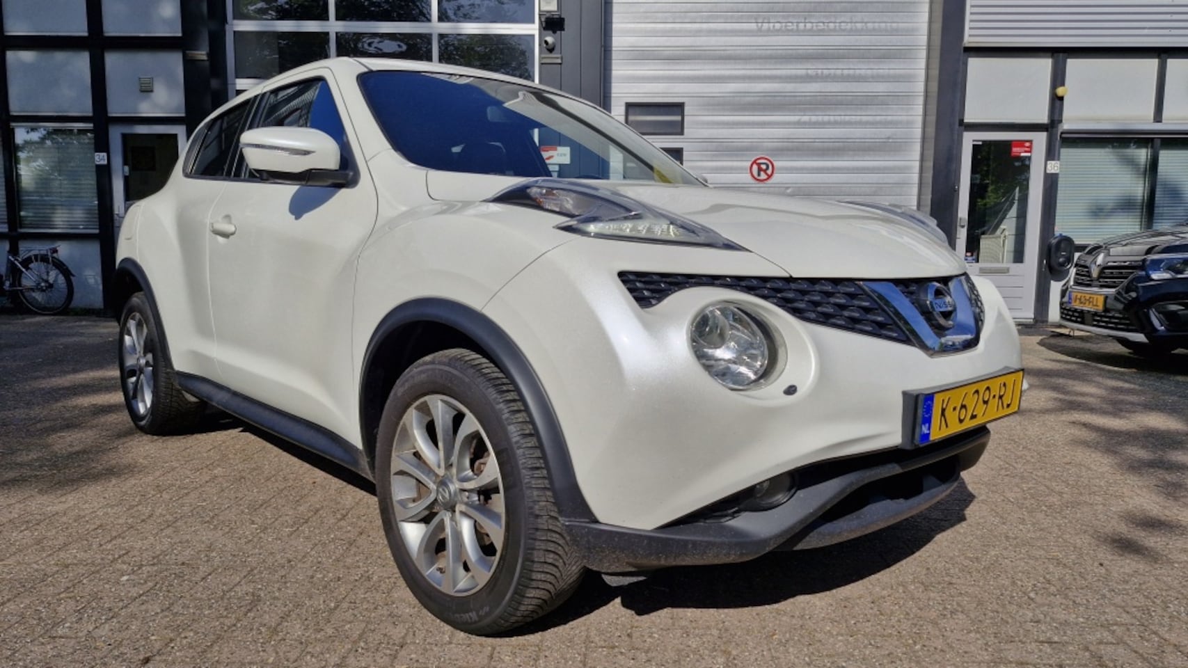Nissan Juke - 1.2 DIG-T S/S Tekna 1.2 DIG-T S/S Tekna - AutoWereld.nl